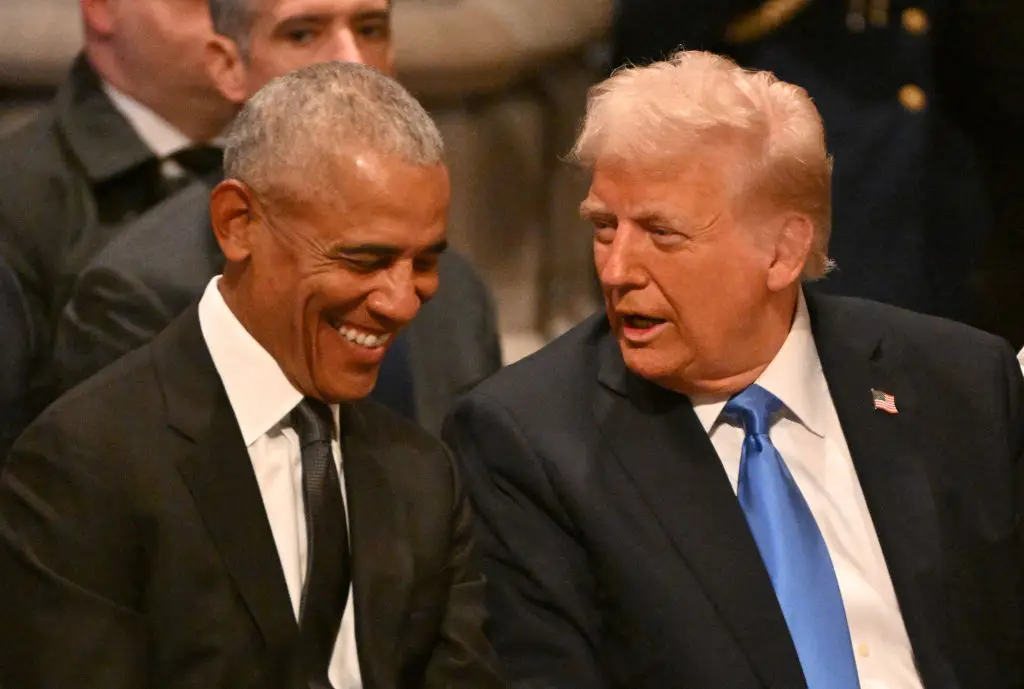 In happier times - Trump and Obama (Photo by ROBERTO SCHMIDT/AFP via Getty Images)