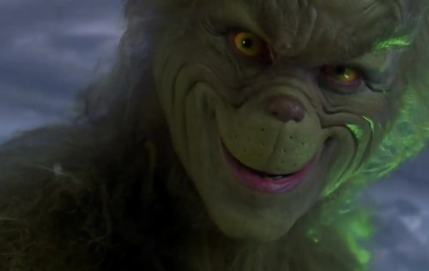 Jim Carrey reveals how the iconic Grinch smirk was created.