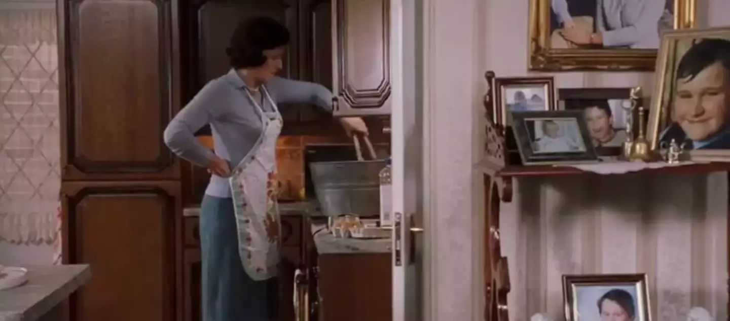 Fans finally have an explanation for what Aunt Petunia's doing in this scene (Warner Bros.)