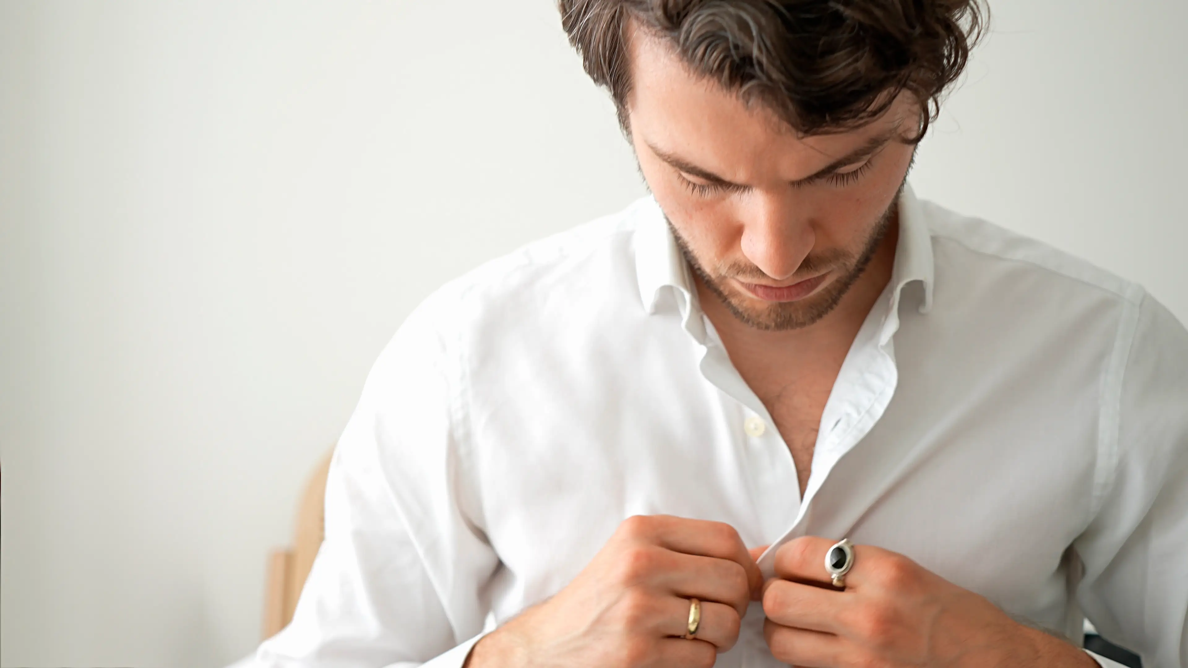 Men button their shirts left to right.