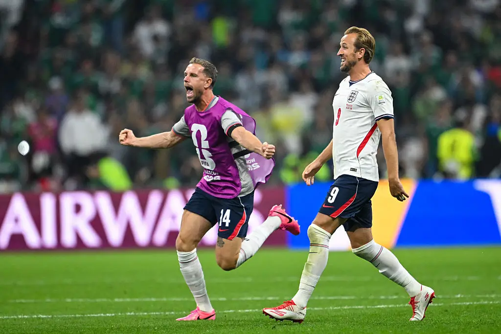 Jordan Henderson got injured after the England Vs Mexico game after jumping over the billboards (Photo by CARL DE SOUZA / AFP via Getty Images)