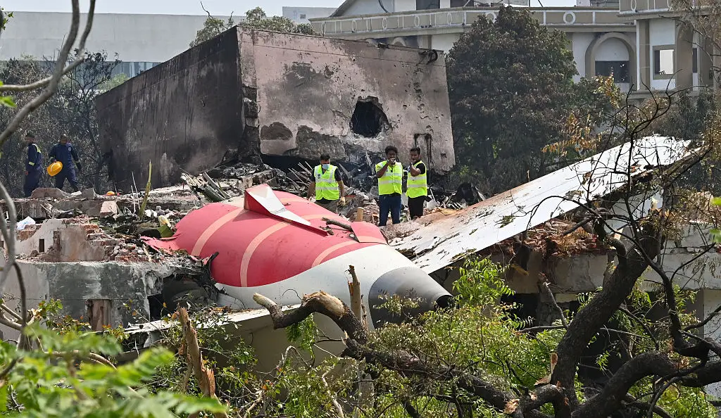 Forensic experts and DGCA officials searching for evidence at Air India Plane crash site, a day after the collision in Ahmedabad, India (Raju Shinde/Hindustan Times via Getty Images)