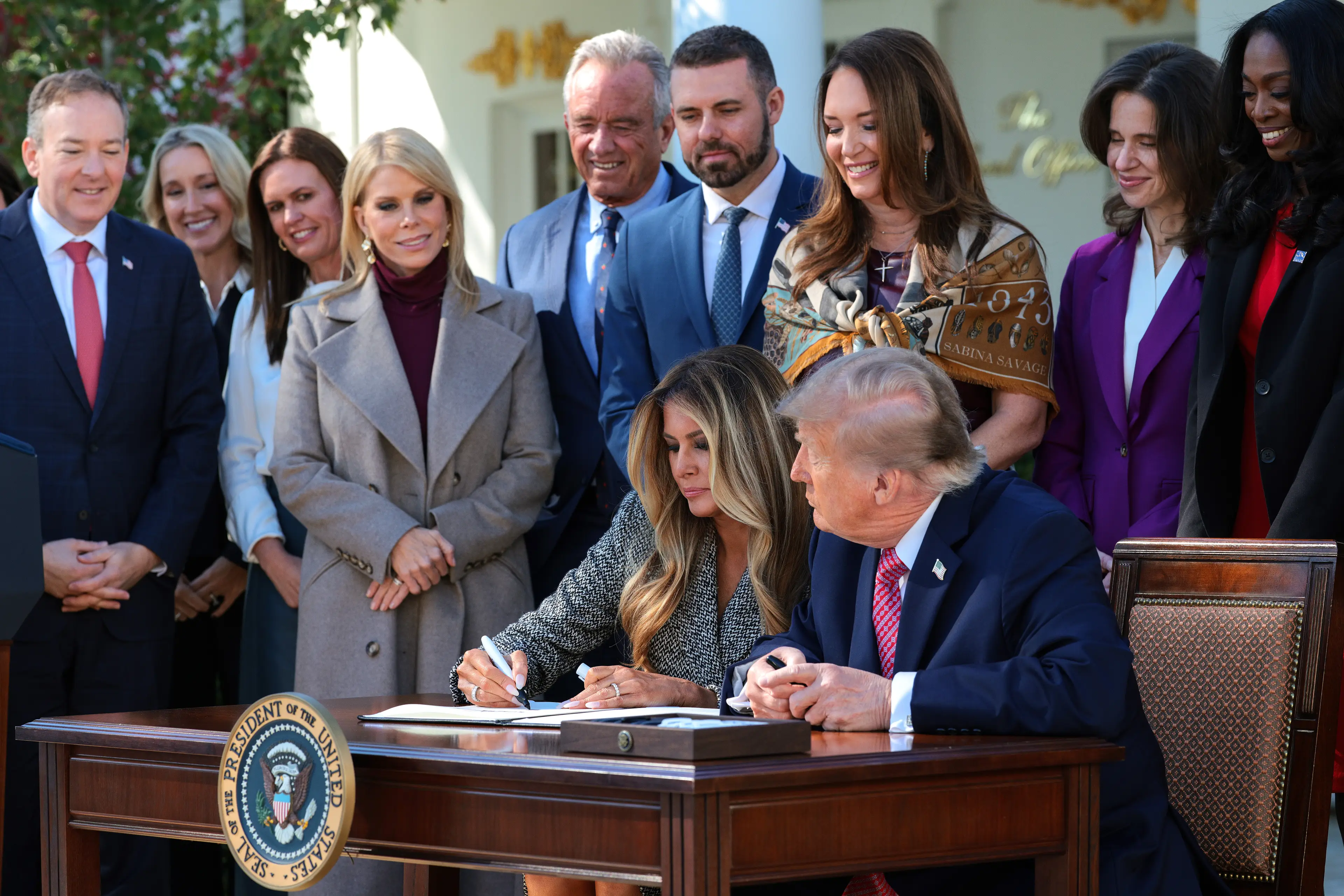 Melania and Donald Trump signing an executive order for women's healthcare (Chip Somodevilla/Getty Images)