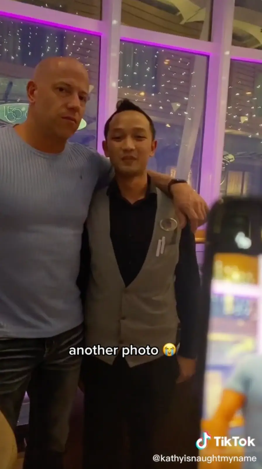 Her boyfriend always takes the time for a photo.