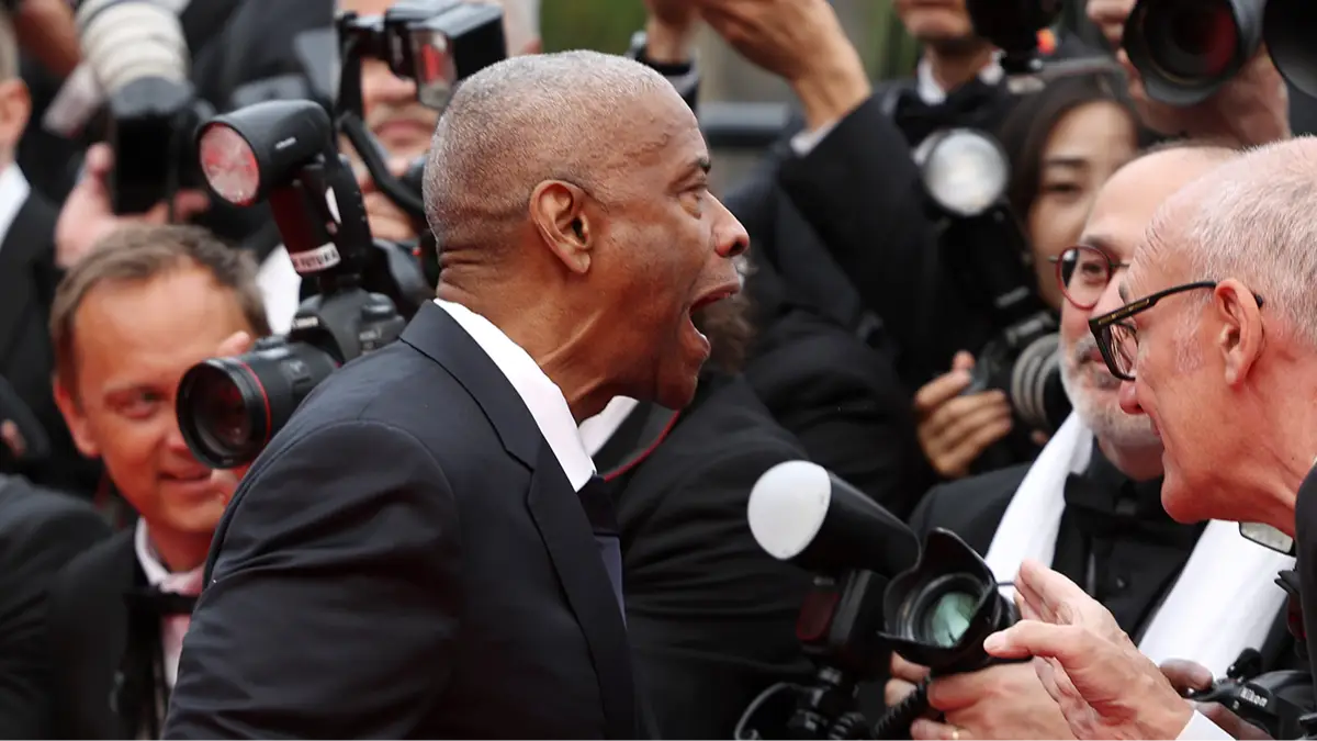 Lip reader 'reveals' what Denzel Washington shouted at photographer during heated exchange on Cannes red carpet