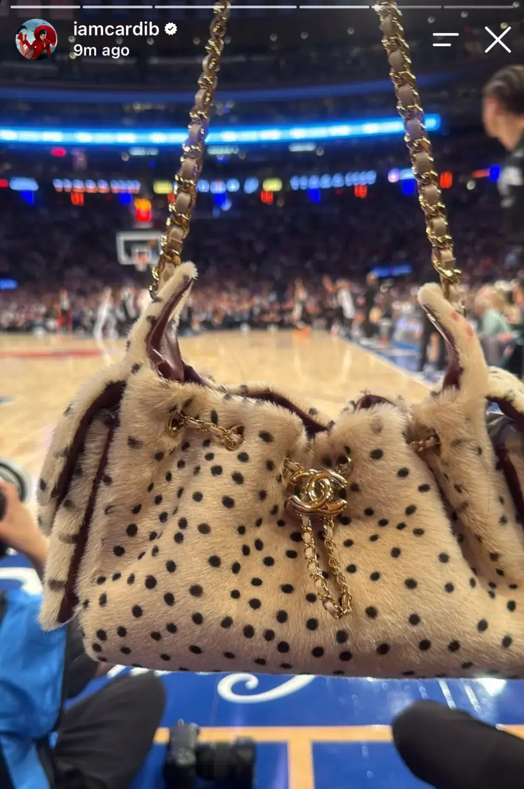 Cardi B showed off her $7k Chanel purse as she watched the Knicks game (Picture: Instagram/CardiB)