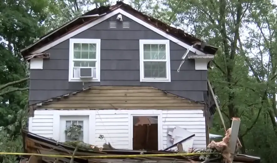 The tree struck their house (WCNC)