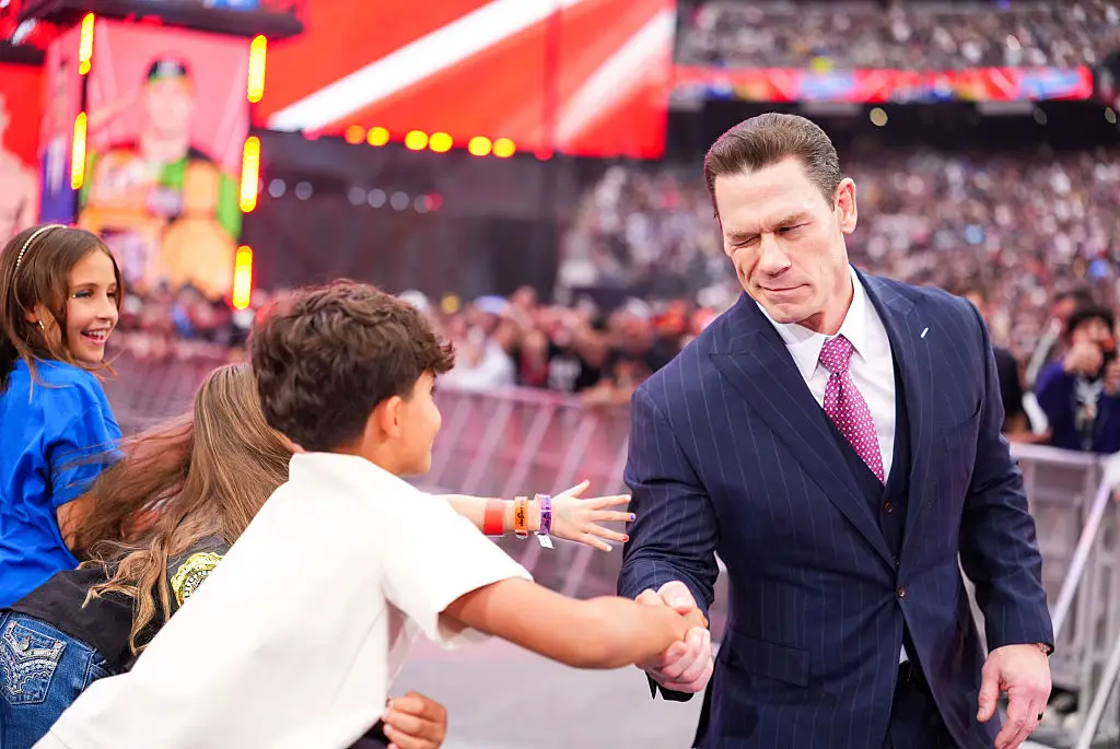 Cena said his outlook has been shaped by treating every opportunity as one he wasn't necessarily entitled to, describing himself as someone who found unlikely success without a traditional path into performing. (Photo by Georgiana Dallas/WWE via Getty Images)