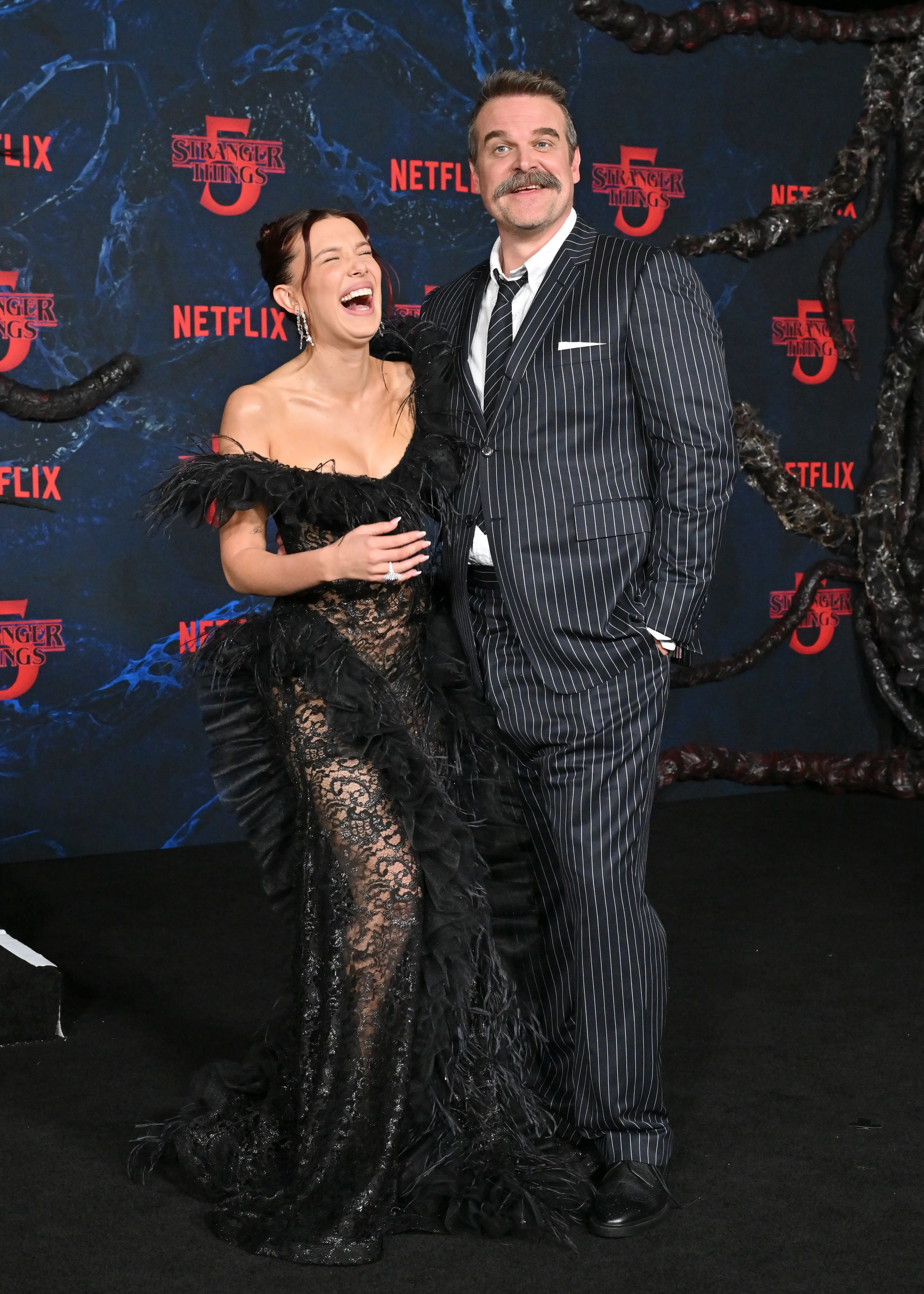 Milly Bobby Brown and David Harbour pictured together at Stranger Things Season Five premiere in Los Angeles last week (Axelle/Bauer-Griffin/FilmMagic)