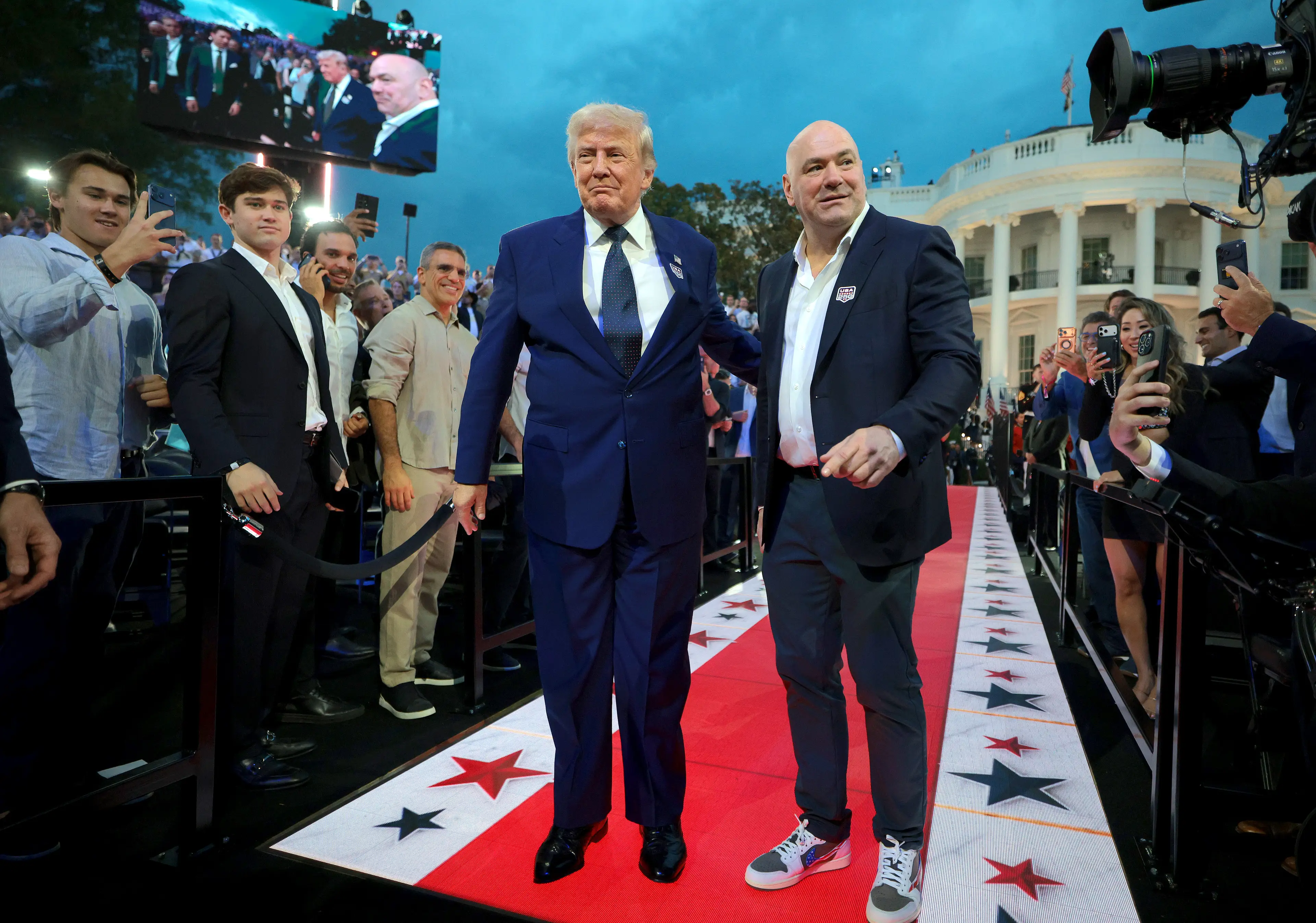 President Donald Trump and UFC President and CEO Dana White walk out of the White House onto the South Lawn for the UFC Freedom 250 fight (Chip Somodevilla/Getty Images)