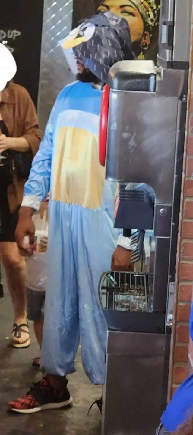 Bluey was portrayed by a man wearing a onesie, much to parents' disappointment. (X/@LasVegasLocally)