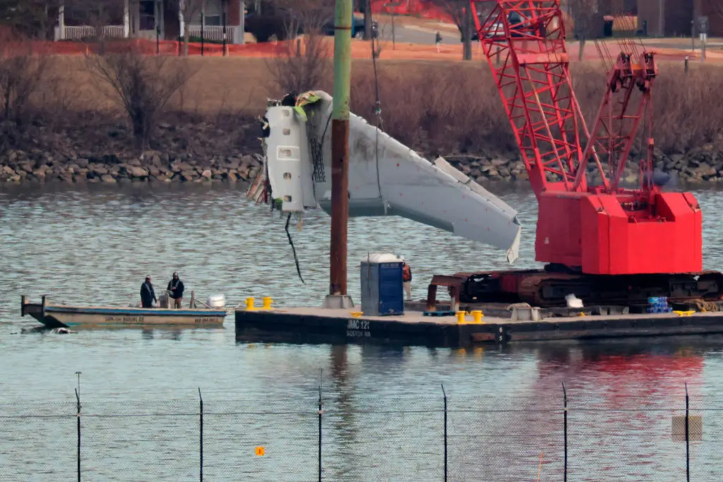 The wreckage being pulled from the Potomac River (Chip Somodevilla/Getty Images)