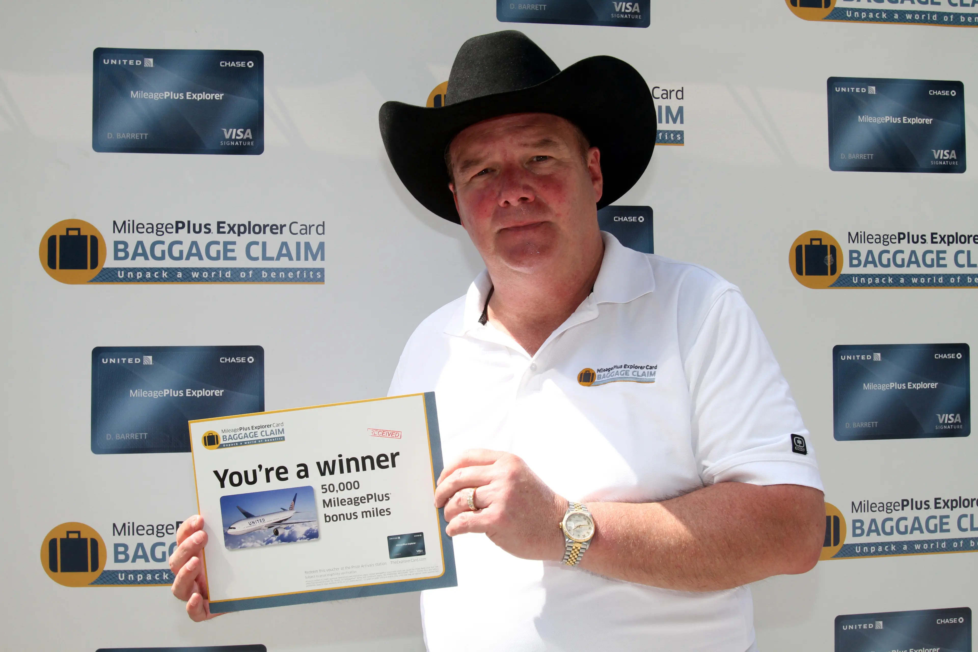 Tom Stuker, pictured here in 2011, has racked up a massive amount of air miles (Tasos Katopodis/Getty Images for Chase United)