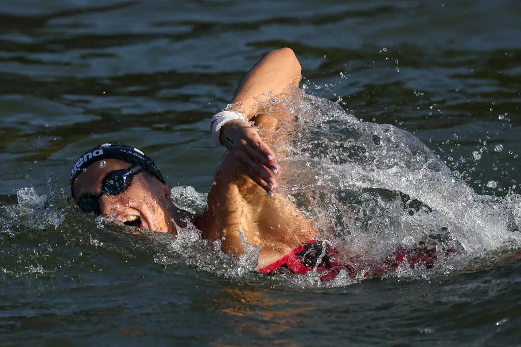 Italy's Giulia Gabbrielleschi swims in the polluted River Seine as she competes in the women's 10km marathon swimming final. (FRANCK FIFE/AFP via Getty Images)