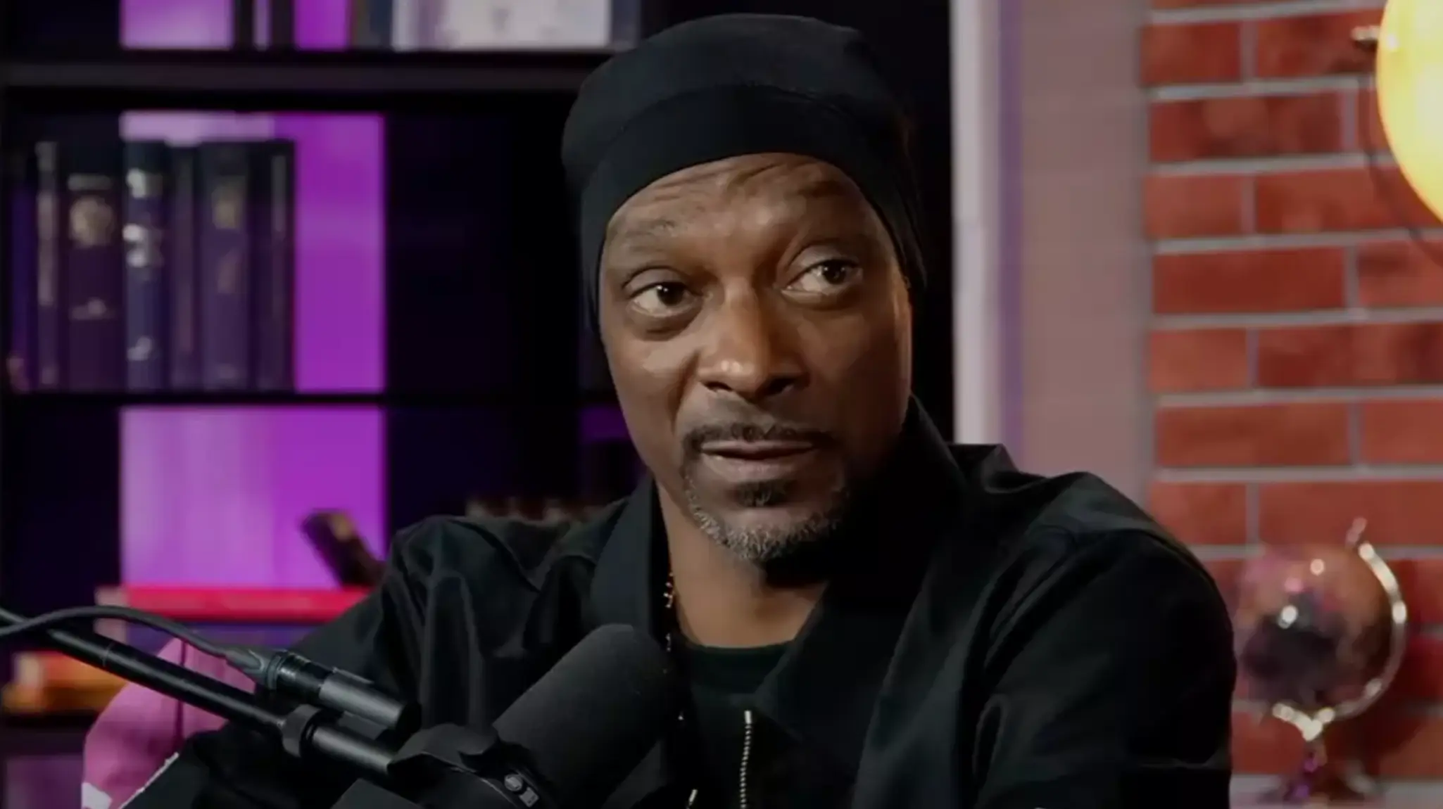 Snoop Dogg was accused of 'homophobia' after he said a same-sex relationship in a film left him 'scared to go to the movies' (It's Giving - Podcast/YouTube)