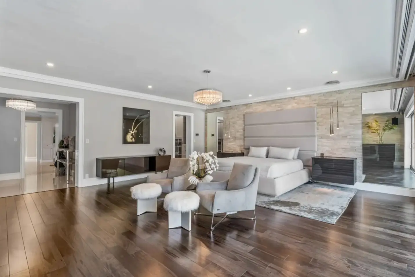 The main bedroom has three walk-in wardrobes.