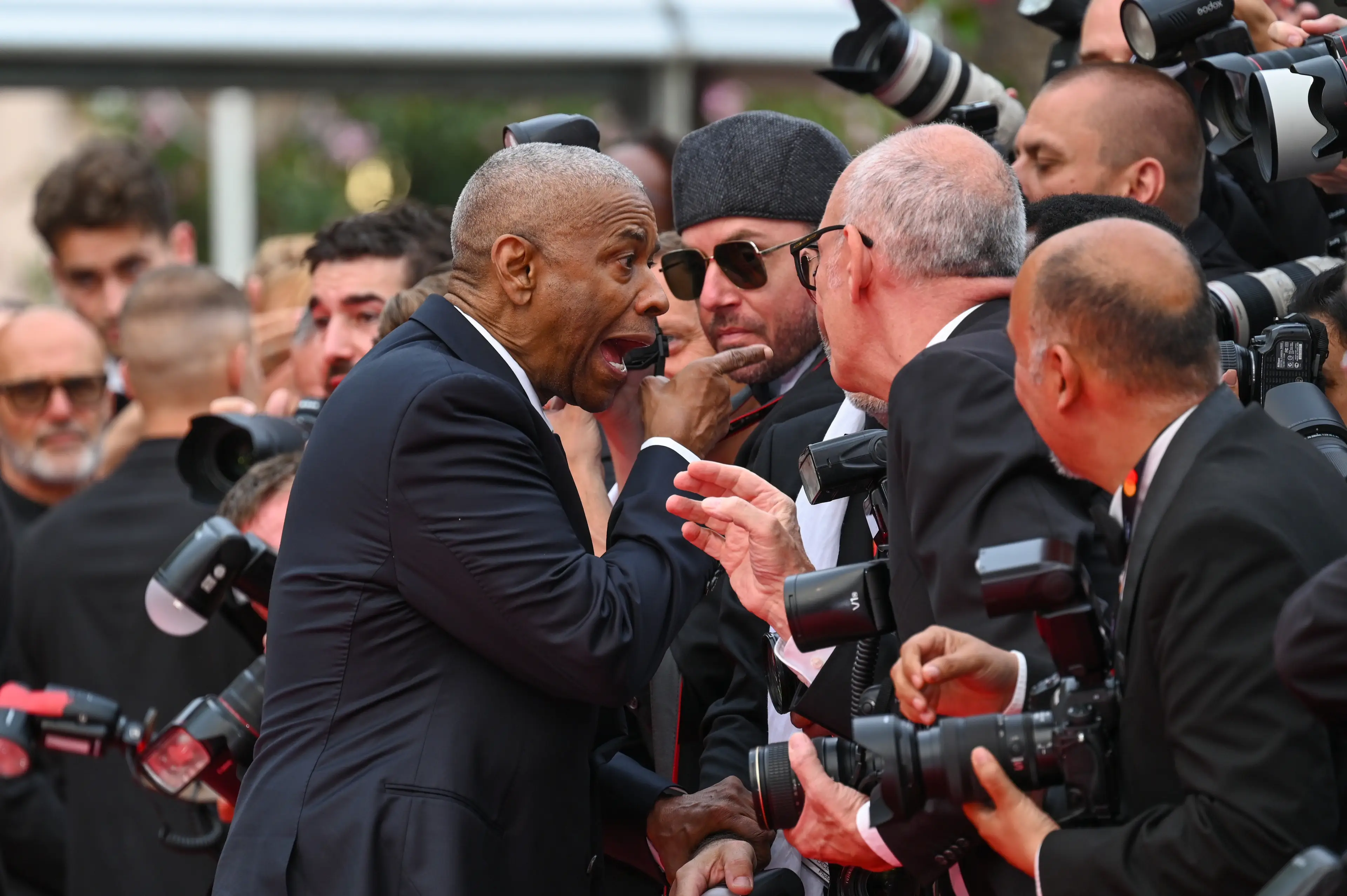 Denzel Washington confronted a photographer after he tried to grab him (Stephane Cardinale - Corbis/Corbis via Getty Images)