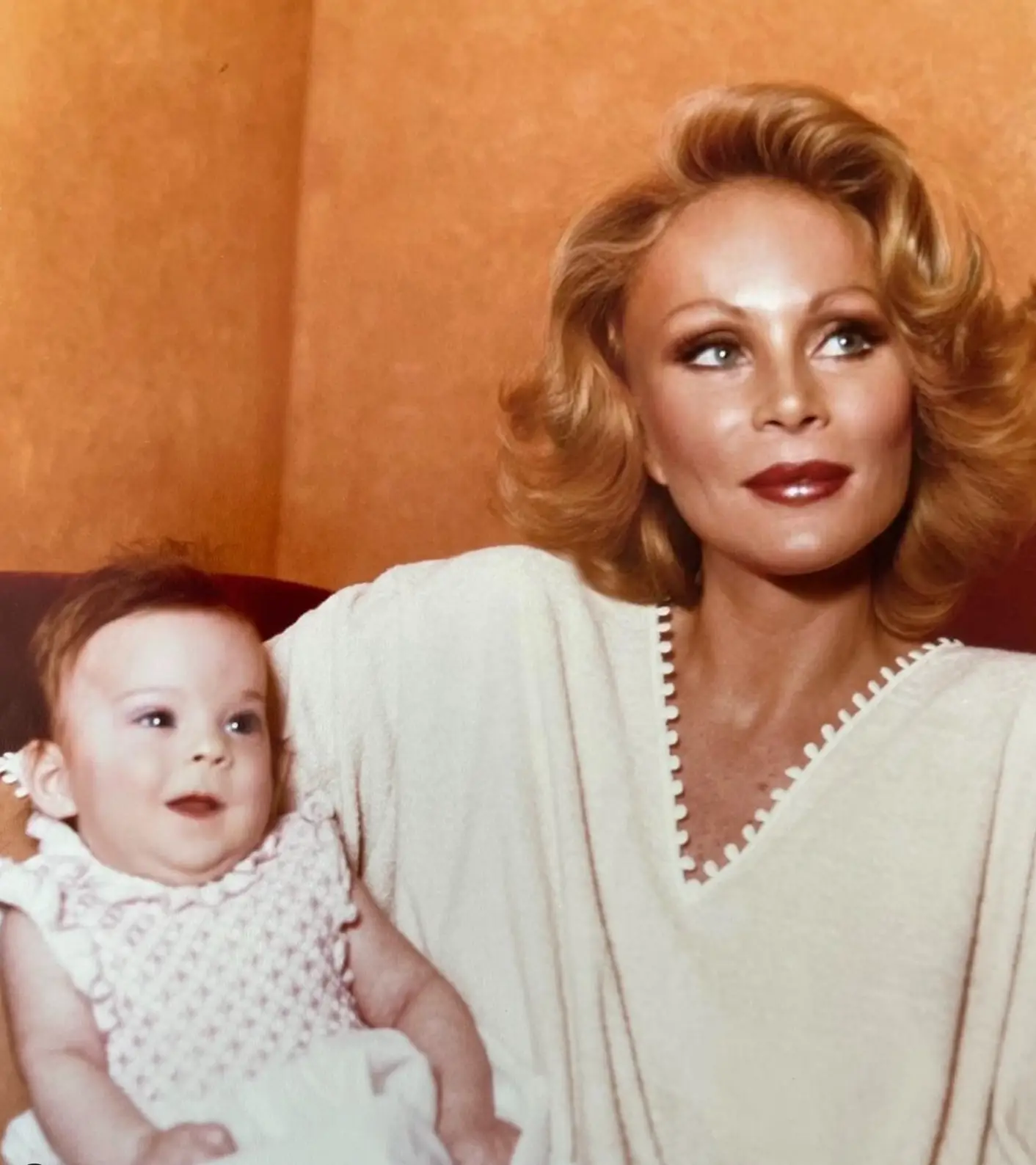 Jocelyn Wildenstein looked like a Bond girl when she was younger, as she cradles her daughter Diane more than 40 years ago. (Instagram/jocelynewildenstein)