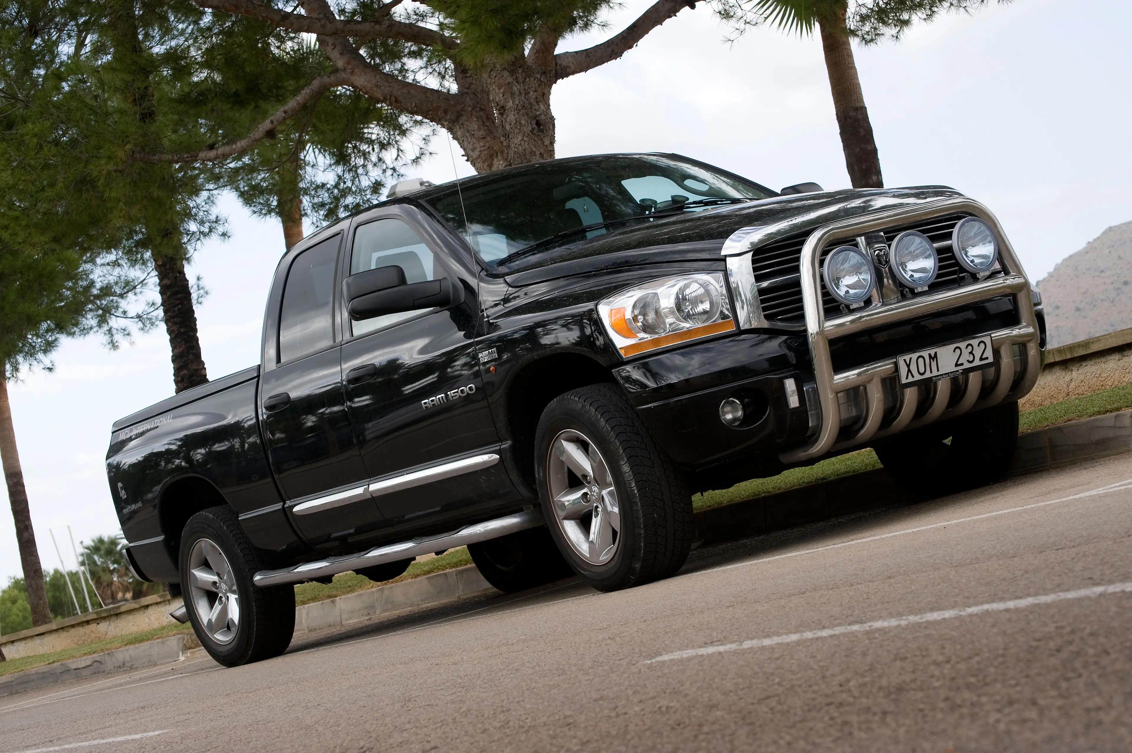 A plastic water bottle was allegedly thrown from the Dodge Ram into the Nissan.