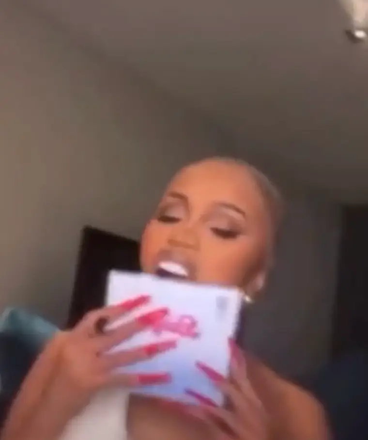 The 'WAP' rapper took to Instagram to share the 'scratch and sniff' process.