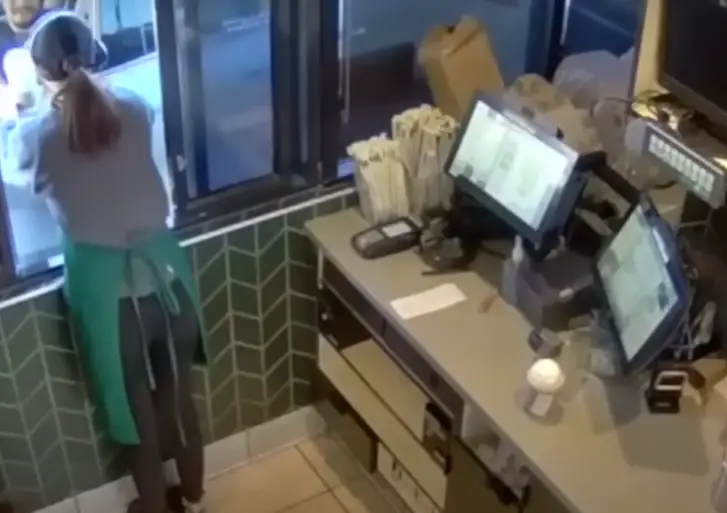 Michael Garcia can be see ordering his Starbucks on the day of the incident (KCAL News)