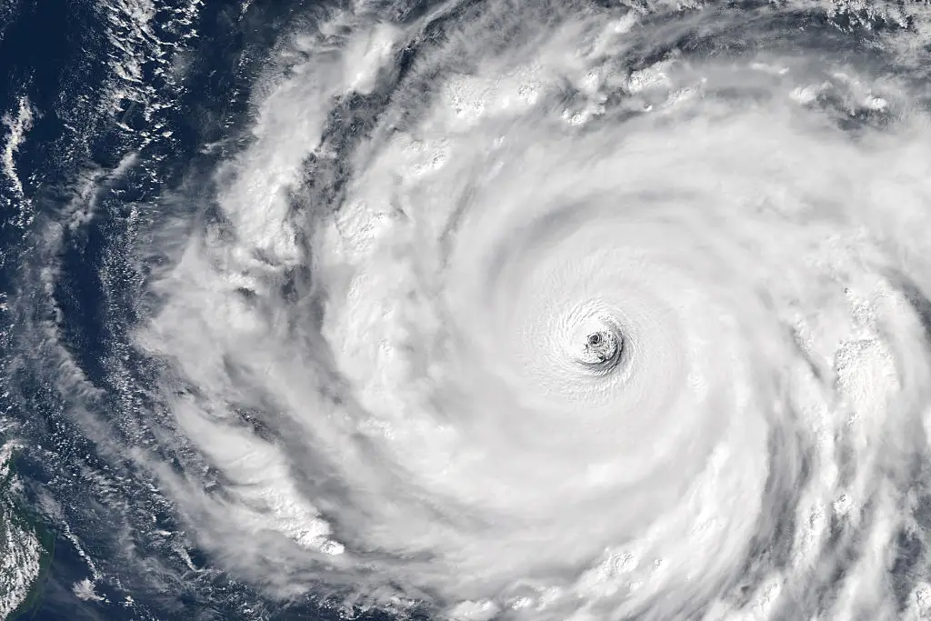 A satellite view shows Super Typhoon Champi, the strongest tropical cyclone of 2026, churning across the Philippine Sea east of Taiwan in the western Pacific Ocean on 21 October 2026. The Category 5-equivalent storm reached peak sustained winds of about 296 km/h (184 mph), becoming the most intense tropical cyclone in 2026 (Gallo Images/Orbital Horizon/Copernicus Sentinel Data 2026)