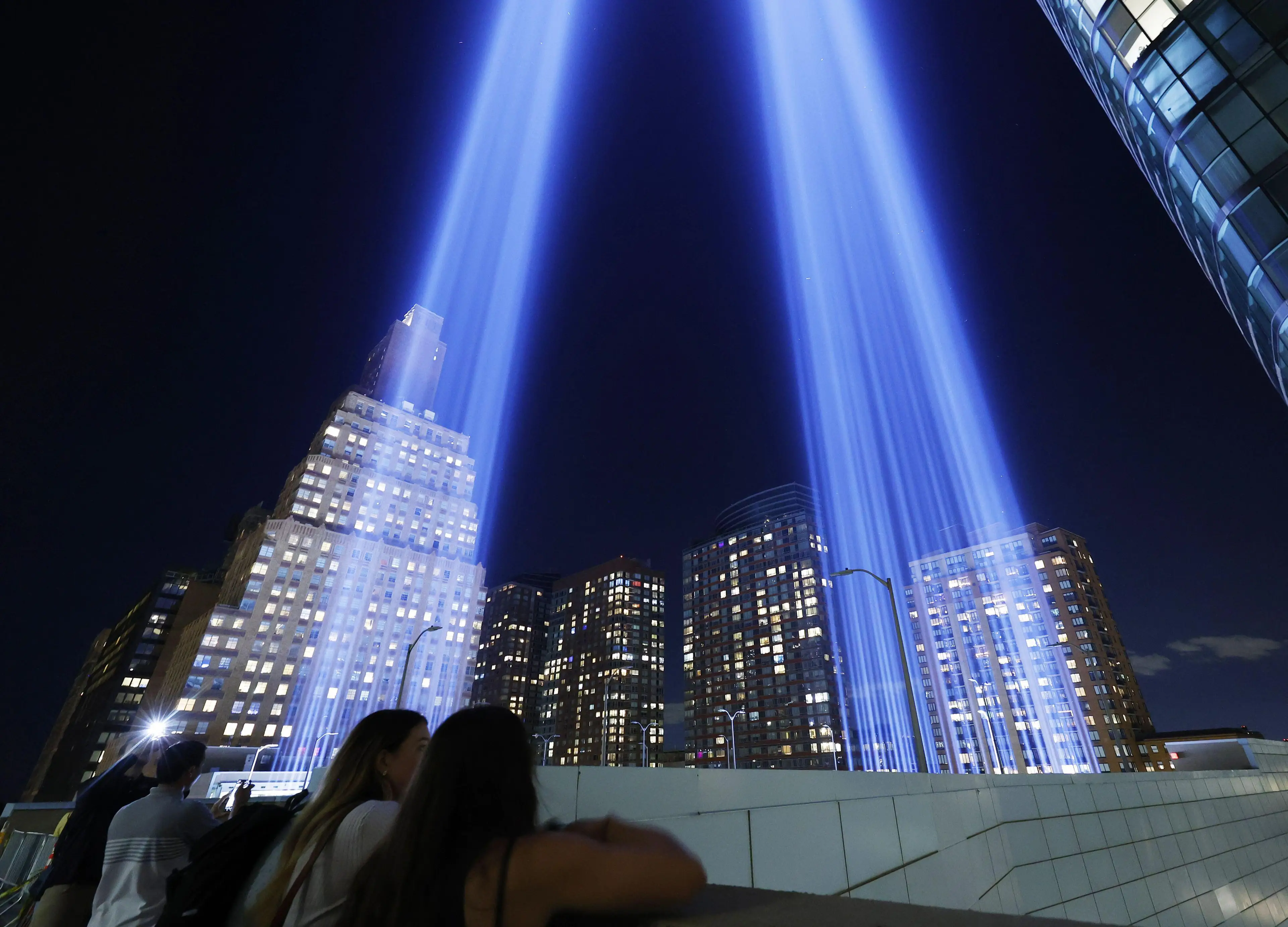 The Twin Towers Tribute In Light art installation shines in Lower Manhattan near One World Trade Center.