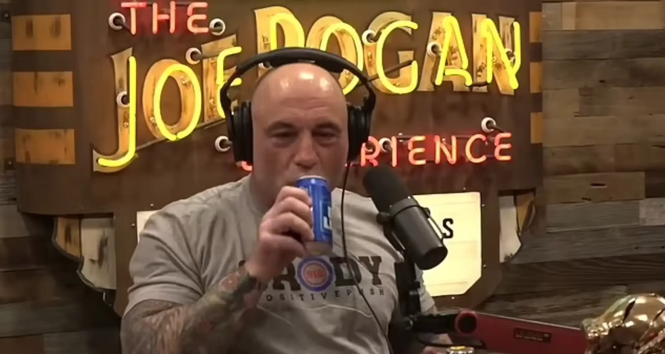 Joe Rogan, who frequently would consume alcohol on his podcast as pictured from an episode back in 2023, has insisted he has stopped drinking (YouTube/PowerfulJRE)