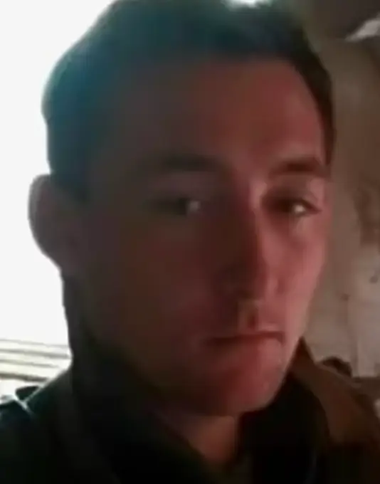 Roman Jr was spotted alive by his parents in a photograph (Facebook/Telegram/@Volodymyr Zelensky)