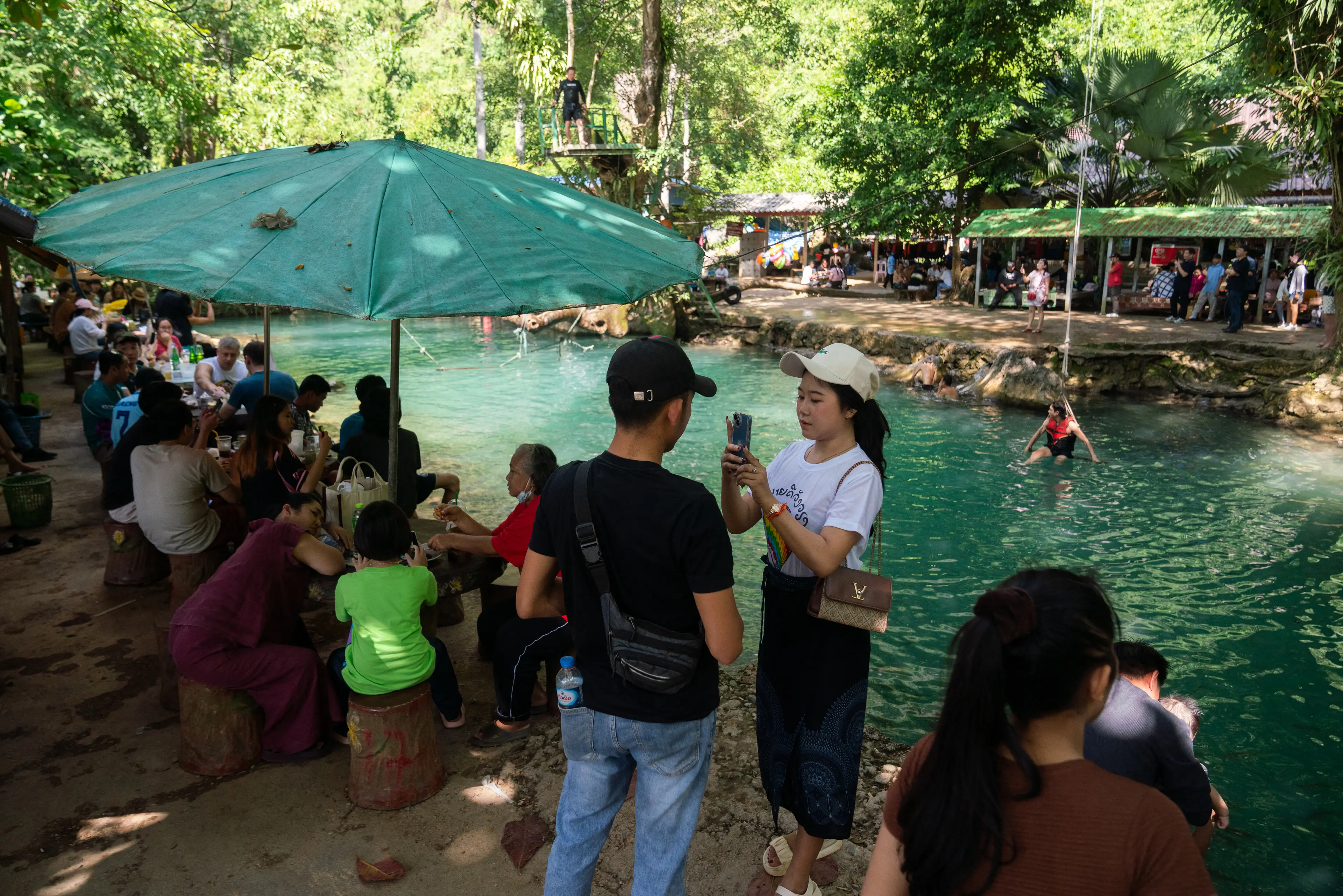 Laos is a popular destination with backpackers for its beautiful scenery and cheap booze (STR/Getty Images)