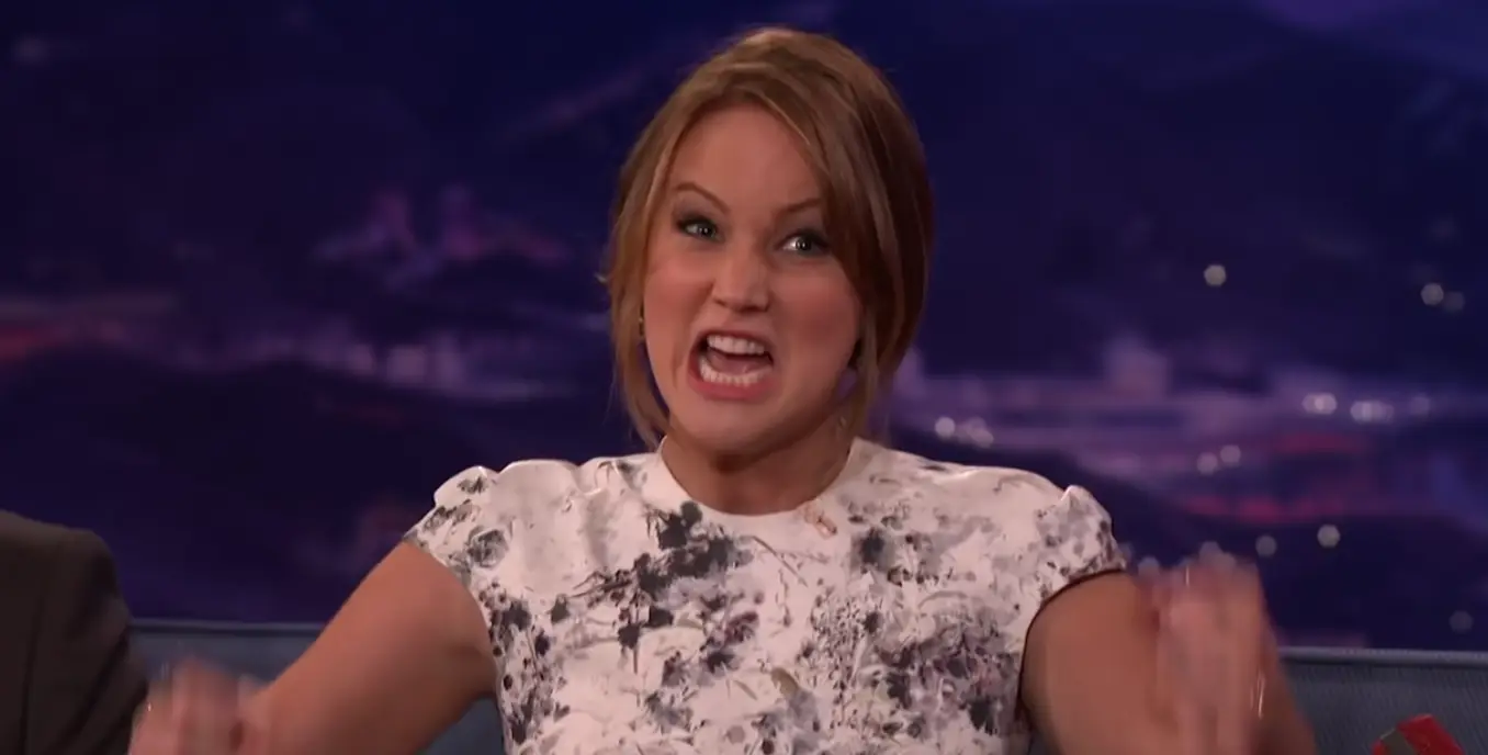 Jen's model face went out the window when football got involved.