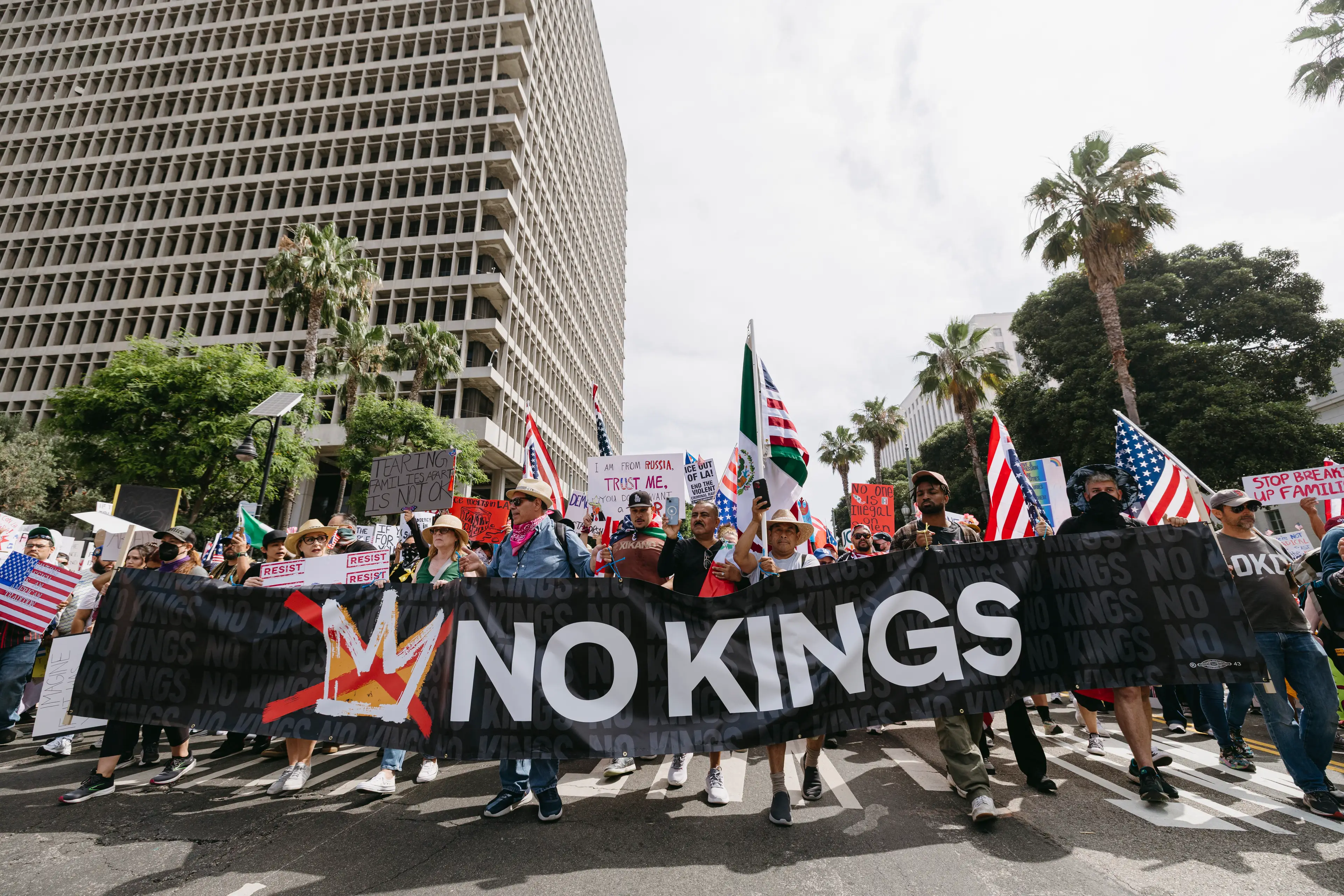 In recent weeks, Trump has been protested across the country (DAVID PASHAEE/Middle East Images/AFP via Getty Images)