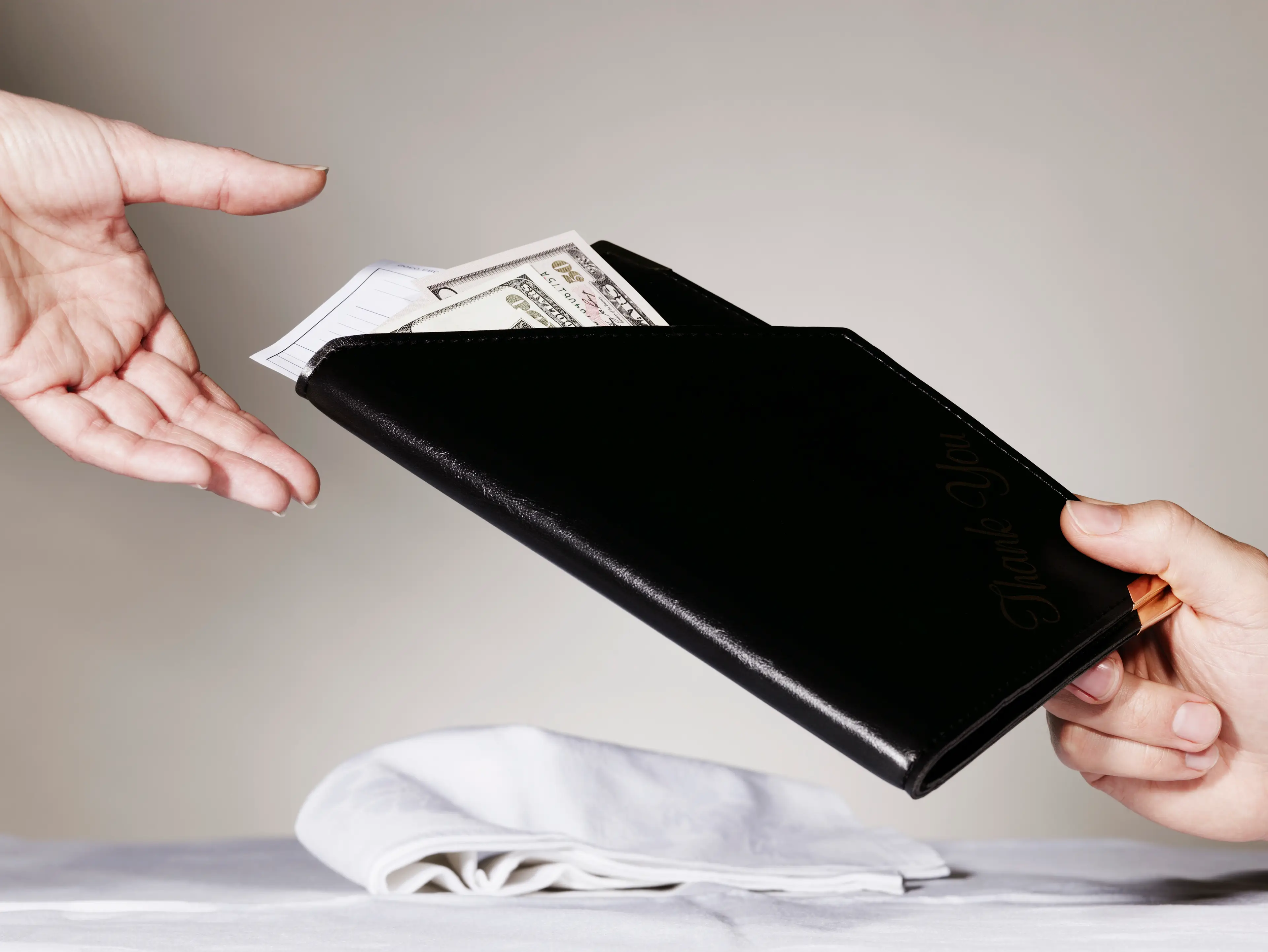 Tipping can be a hot topic. (Flashpop / Getty)