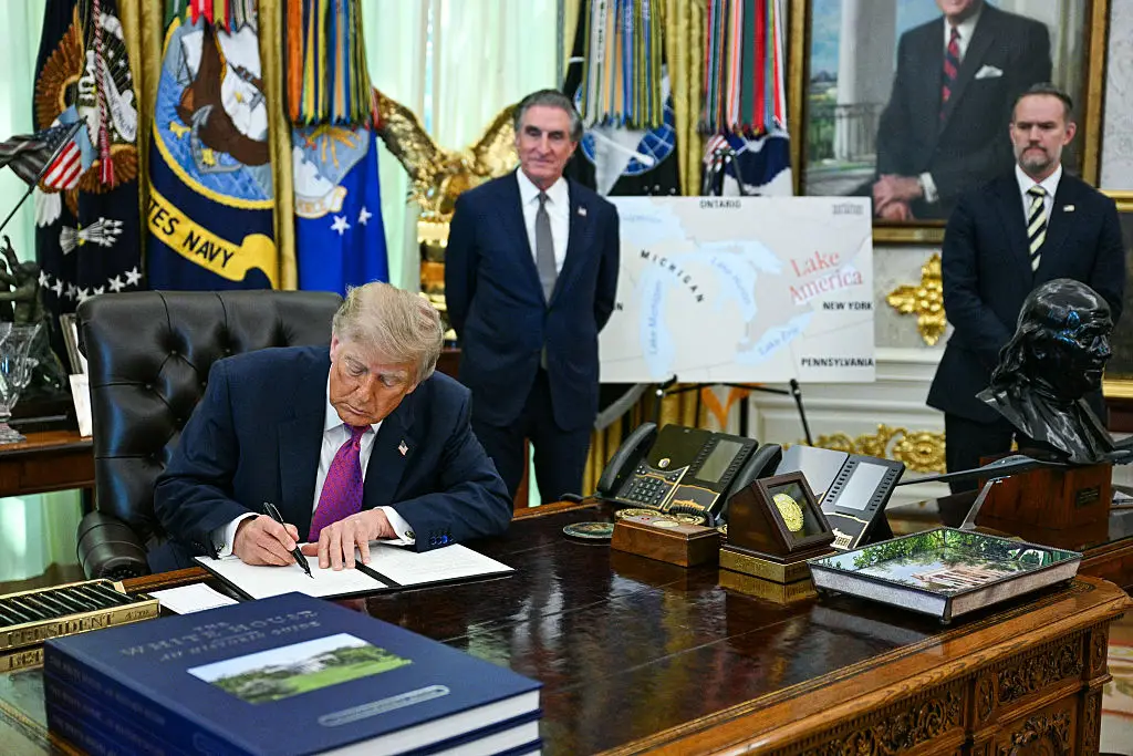 US President Donald Trump has signed an executive order that aims to rename Lake Ontario to Lake America. (Photo by Jim WATSON / AFP via Getty Images)