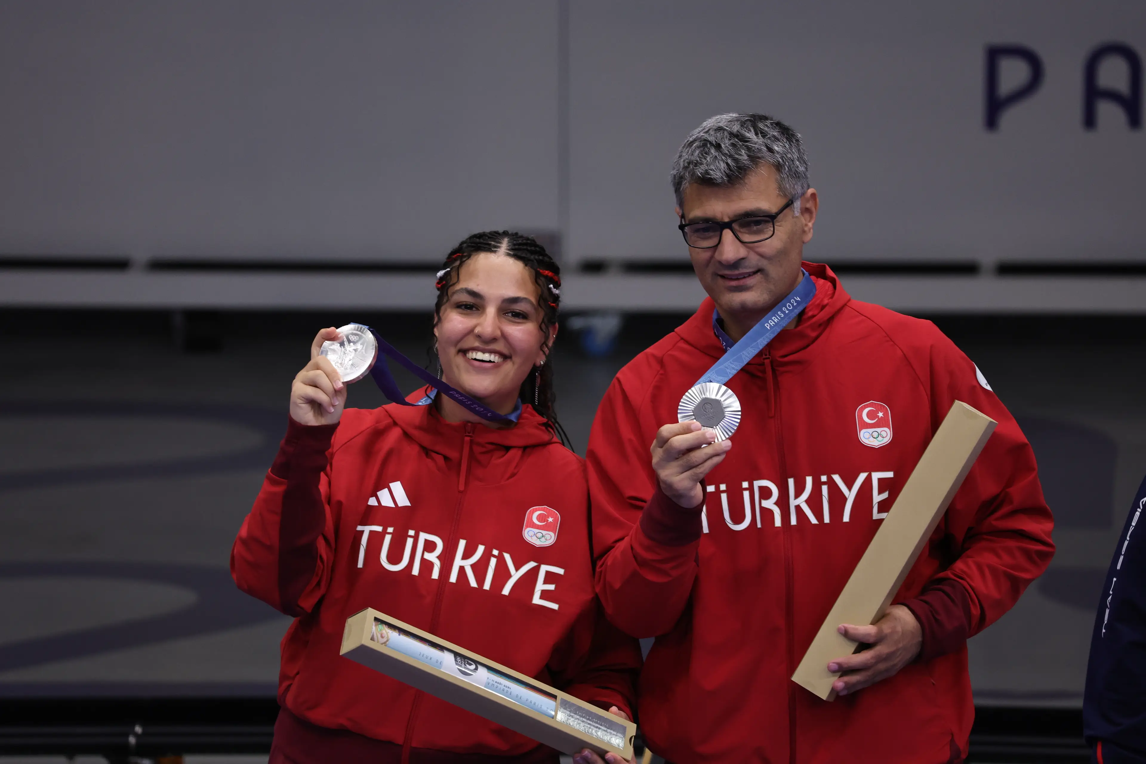 Shooters Şevval İlayda Tarhan and Yusuf Dikeç. (Turkish Youth&amp;Sports Ministry / HANDOUT/Anadolu via Getty Images)