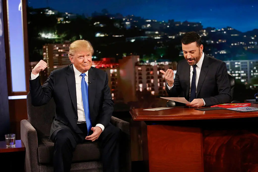President Donald Trump, pictured appearing on 'Jimmy Kimmel Live!' during his presidential campaign in 2016, has threatened to sue ABC after the broadcaster re-hired Kimmel (Randy Holmes/Disney General Entertainment Content via Getty Images)