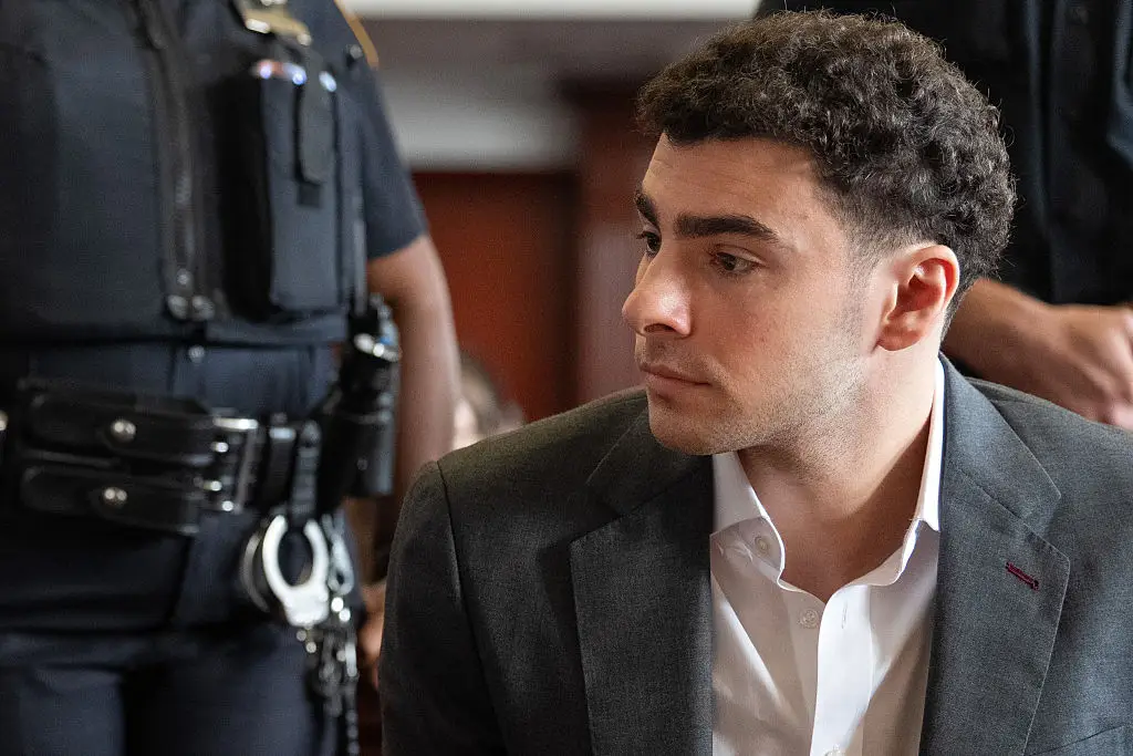 Dawson said Mangione appeared more focused and attentive in some courtroom moments where his mouth was closed and not smiling (Pool/Pool/Getty Images)