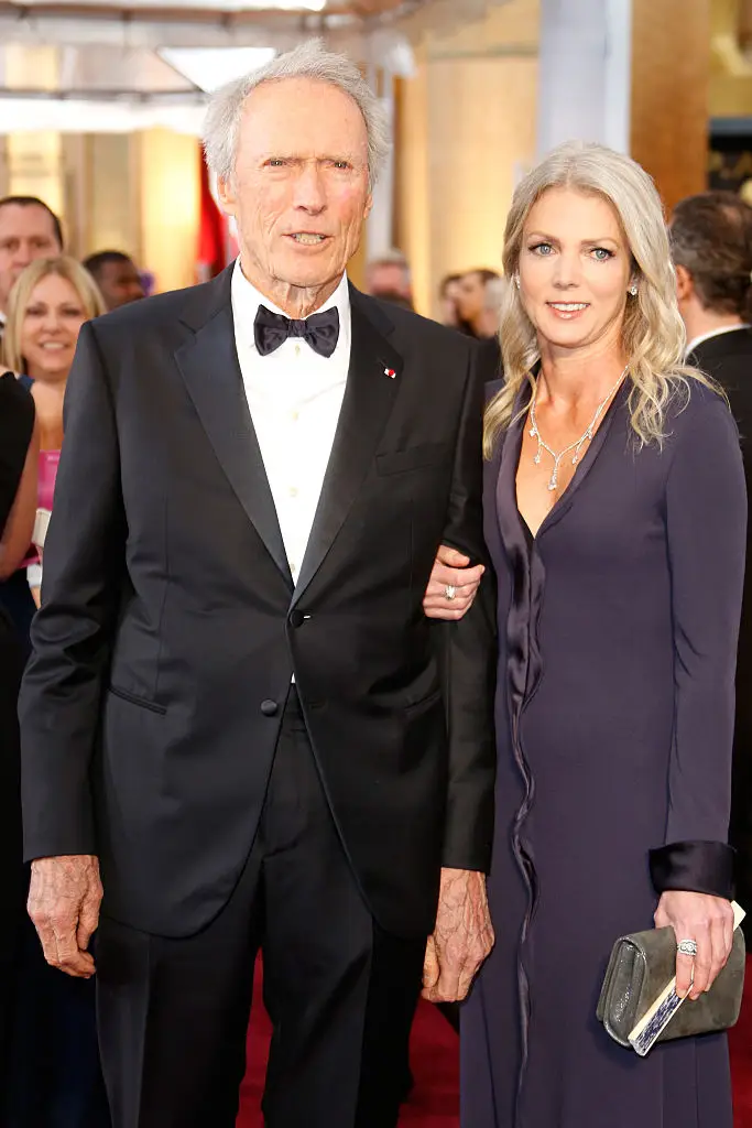 Clint Eastwood and Christina Sandera pictured at the Oscars in 2015. (Jeff Vespa/WireImage)