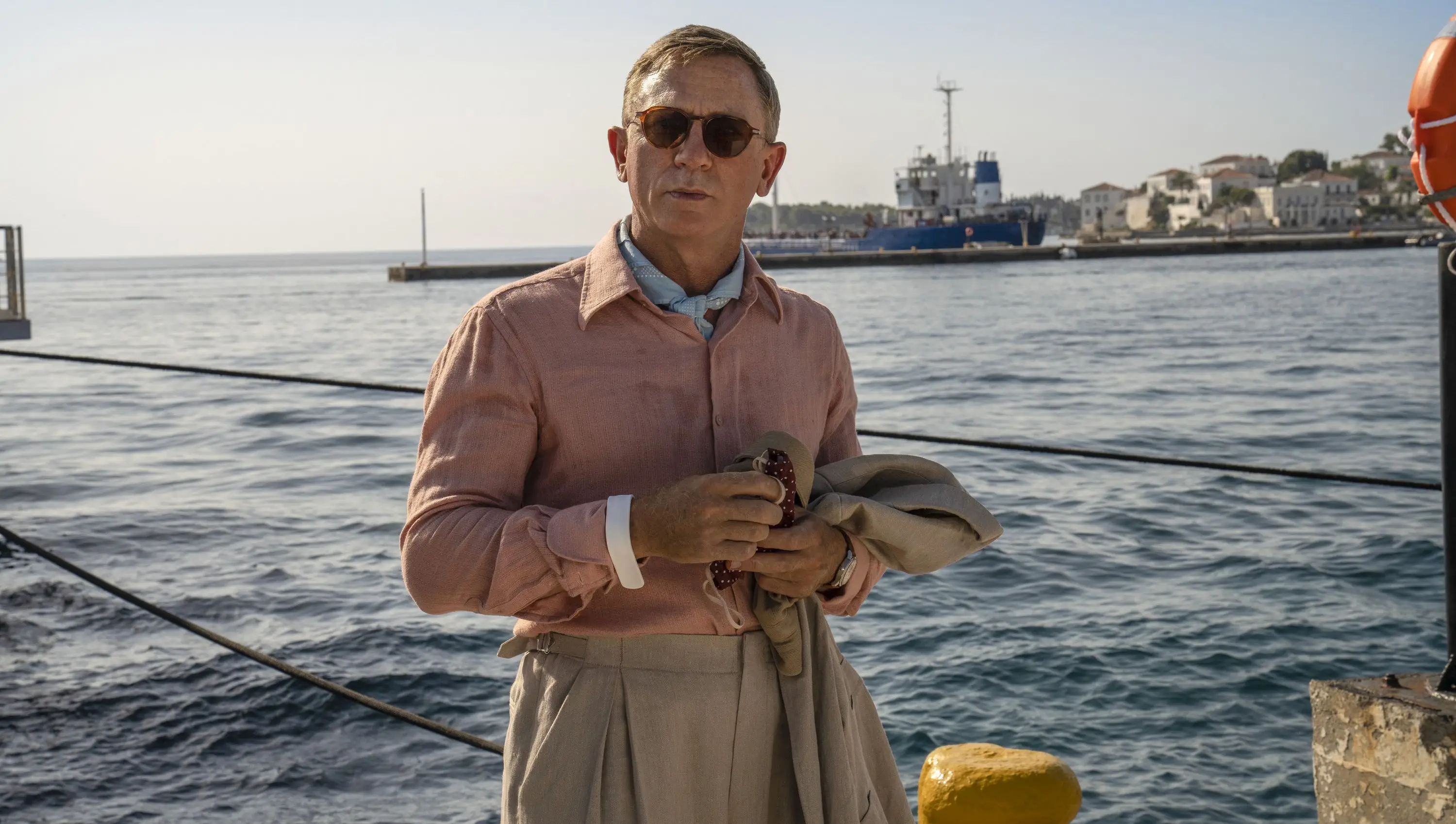 Daniel Craig as Benoit Blanc.