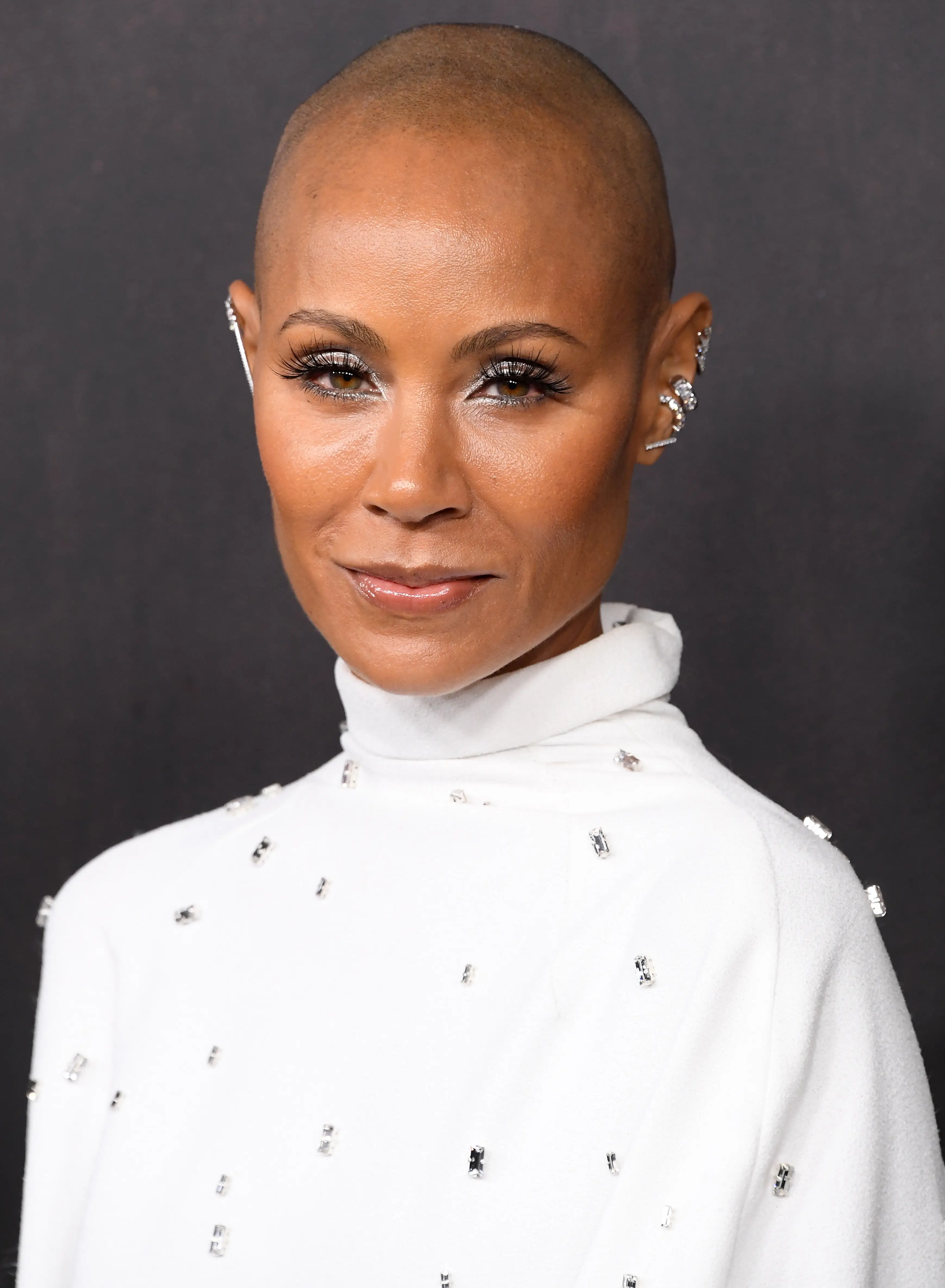 Jada Pinkett Smith spoke about the awkward moment with Chris Rock as she promoted her new book.