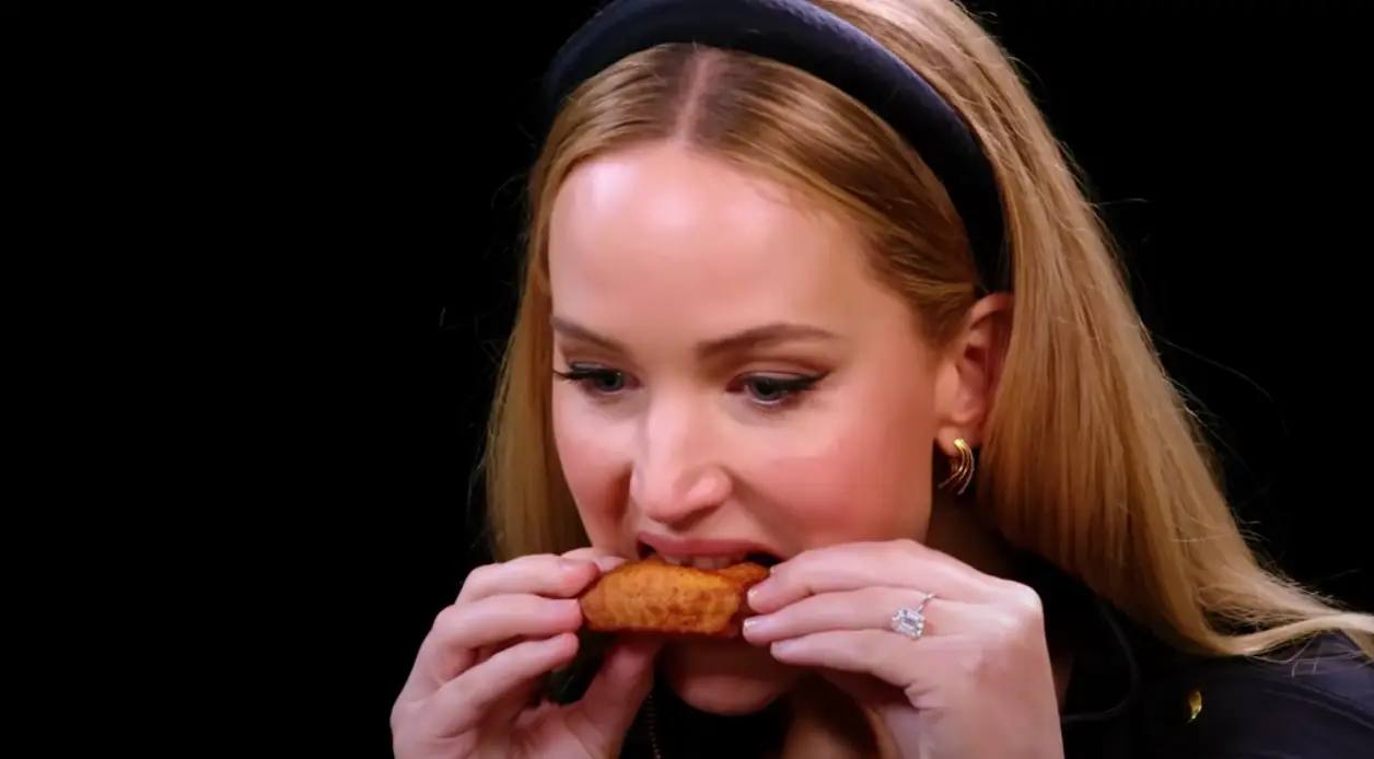 Lawrence tackling the hot sauce called Da Bomb Beyond Insanity.