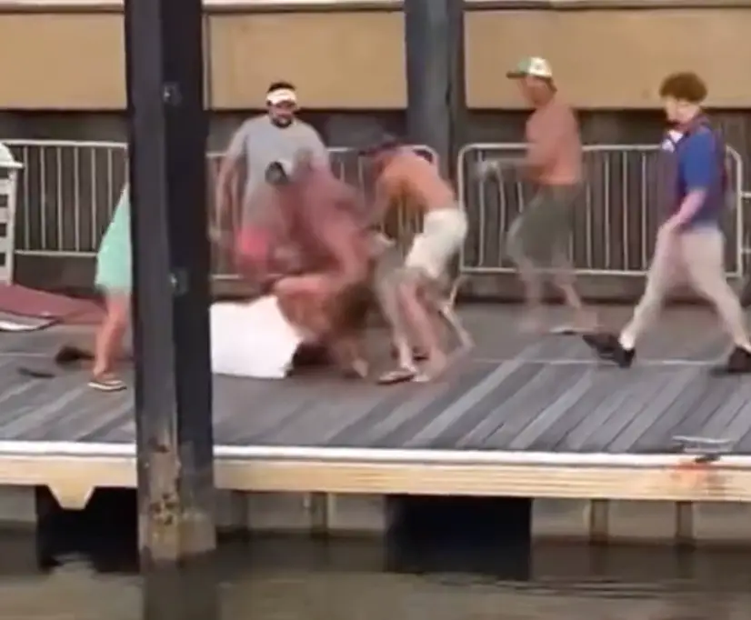 The group of boaters allegedly ganged up on the employee.