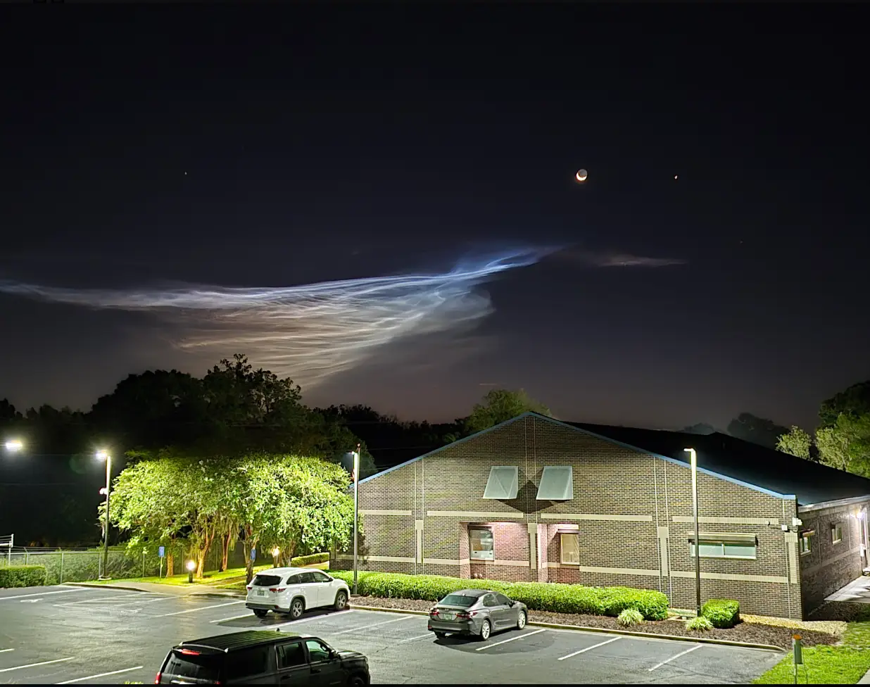 Noctilucent clouds essentially look like a slivery wisp of cloud that is entwined with itself in a white and blue hue. (NWSTampaBay)