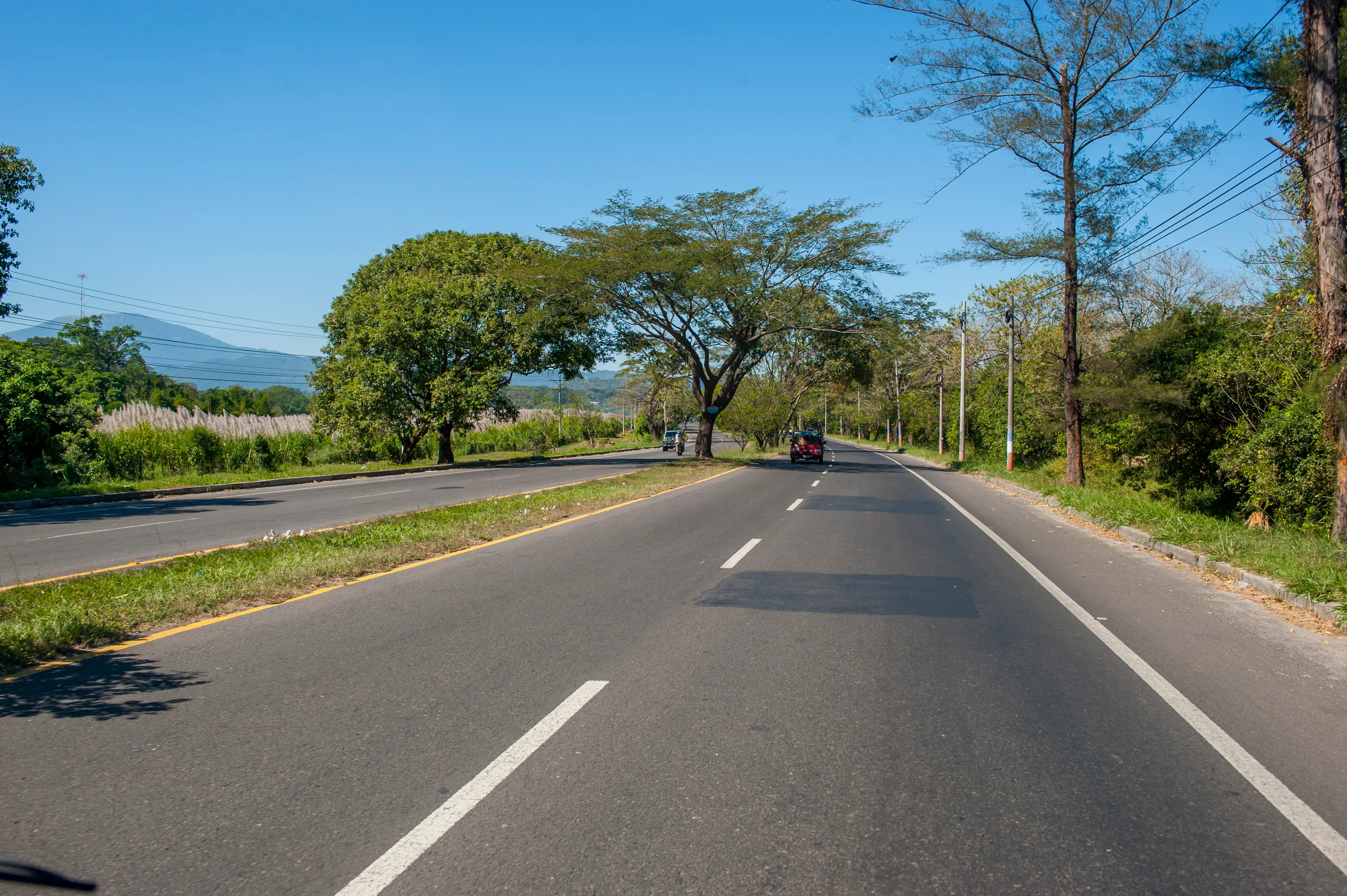 The road travels through a range of landscapes.
