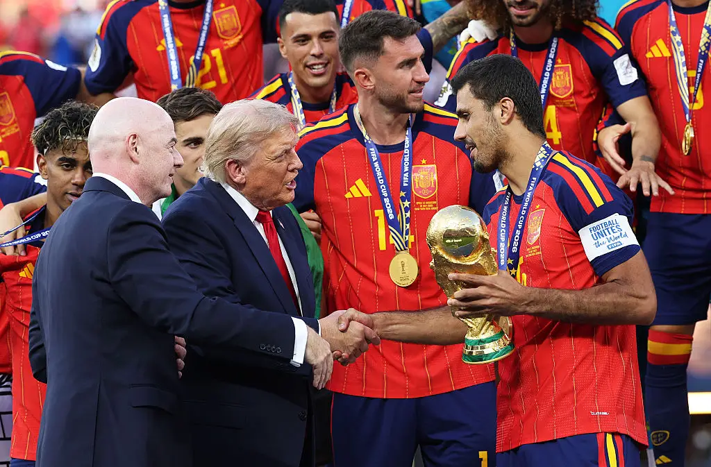 Donald Trump's role was to hand the medals and trophy to the teams, but he took it one step further (Carl Recine/Getty Images)