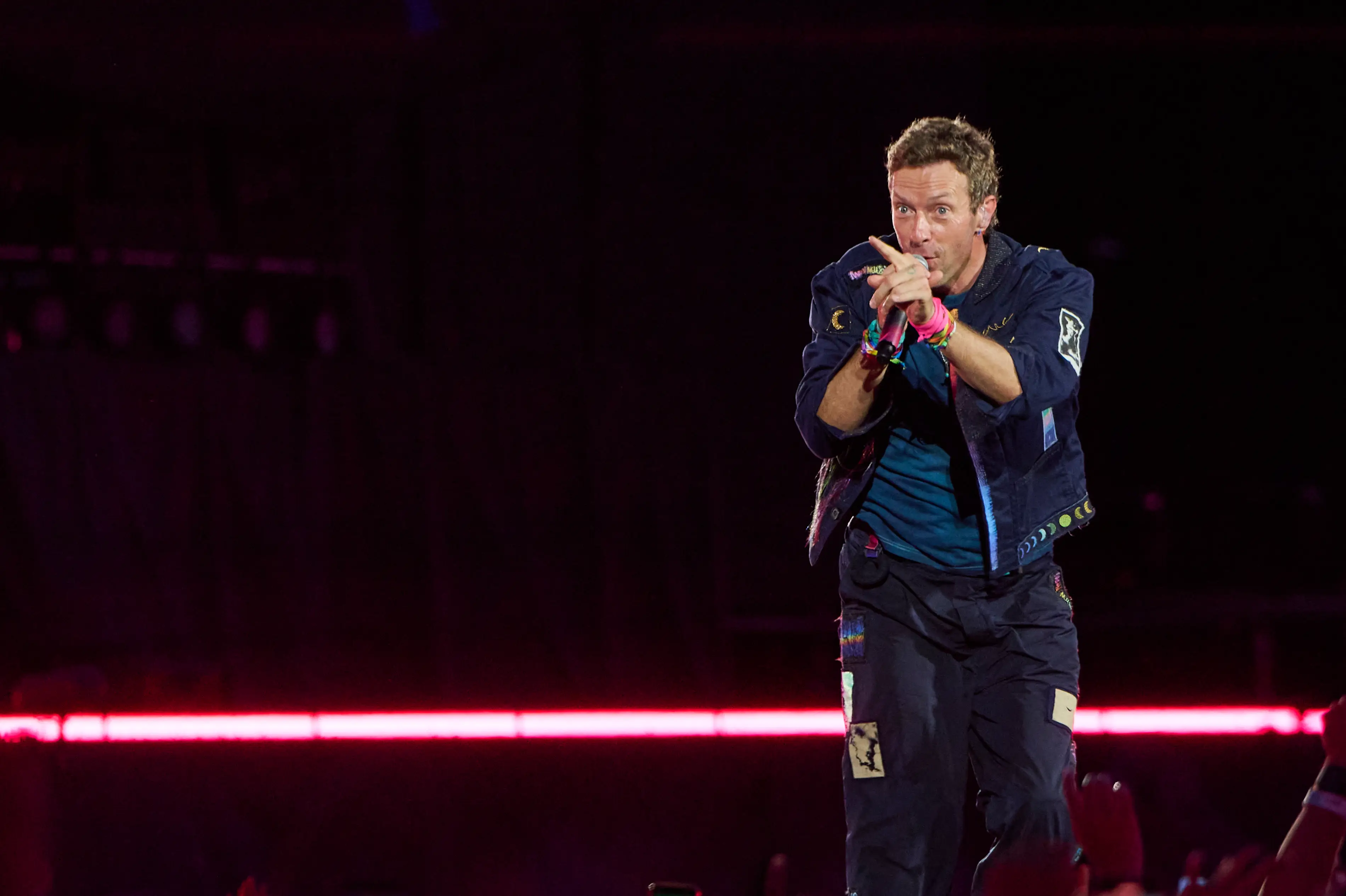 Chris Martin called attention to the pair (Robert Okine/Getty Images)
