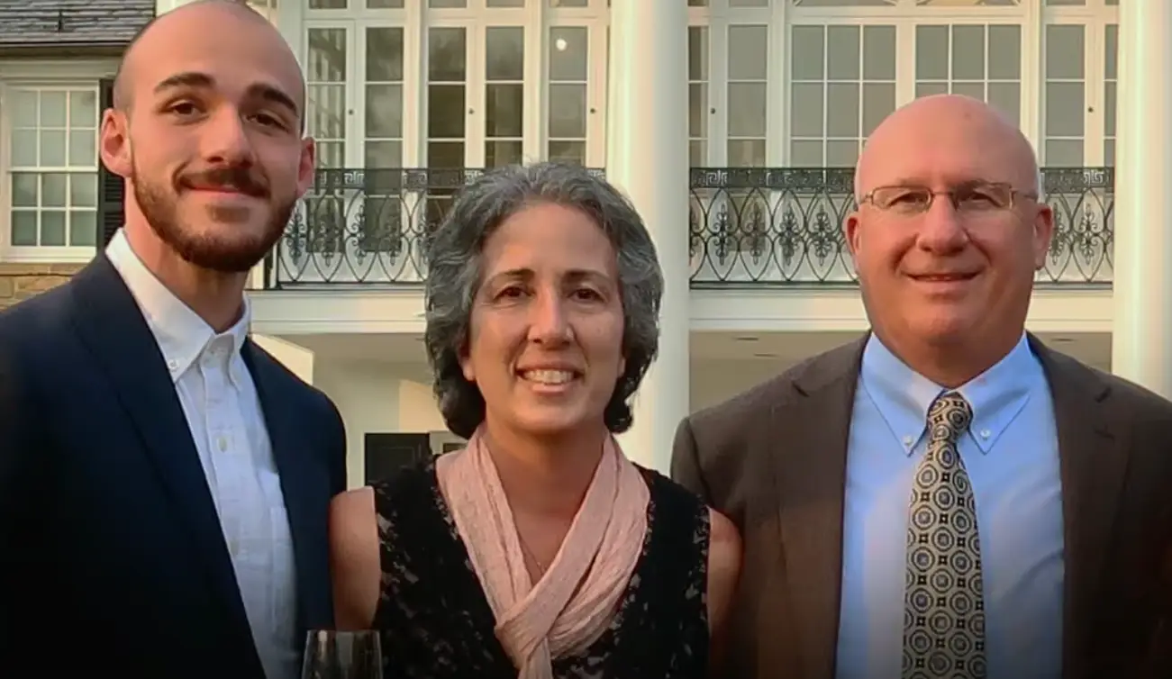 Brian pictured with his parents, Roberta and Christopher (Netflix)