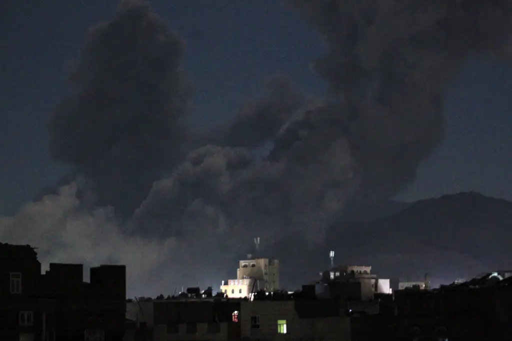 A plume of smoke billows during a US strike on Yemen's Huthi-held capital Sanaa (MOHAMMED HUWAIS/AFP via Getty Images)