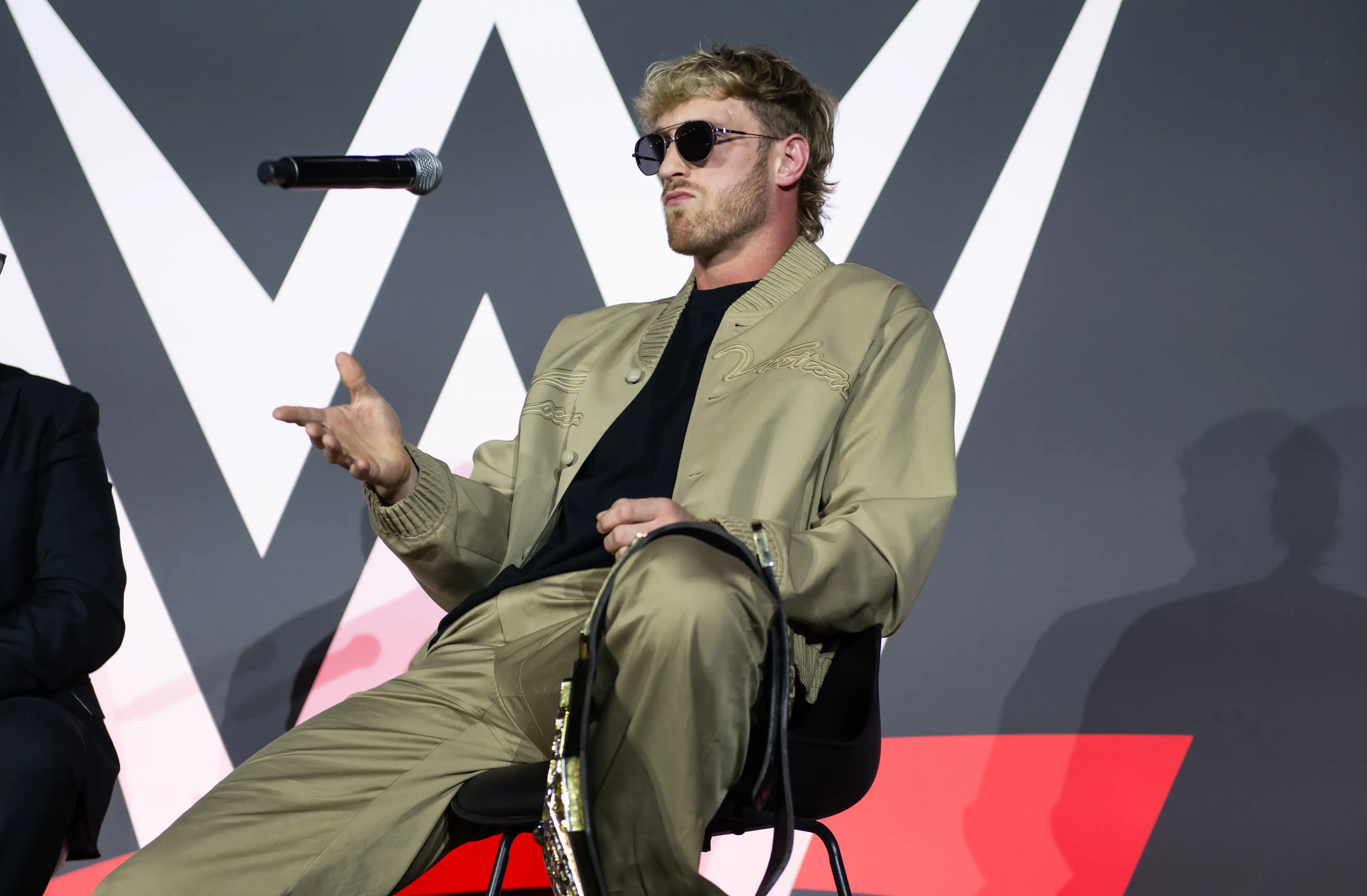 Paul appeared visibly uncomfortable at the questions. (WWE/Getty Images)