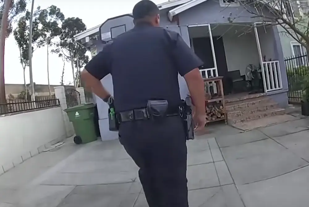 The officers visited the house after receiving a domestic violence 911 call. Luis Herrera's parents later emerged from the house.